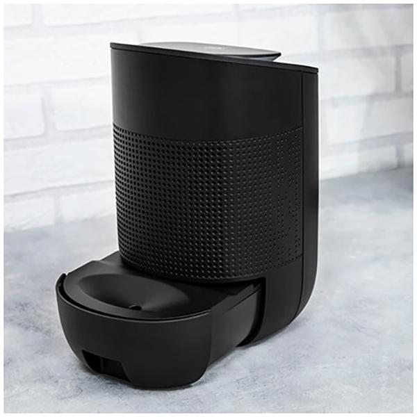 Czarny automatyczny karmnik dla zwierząt. Ma tackę na jedzenie i pojemnik.