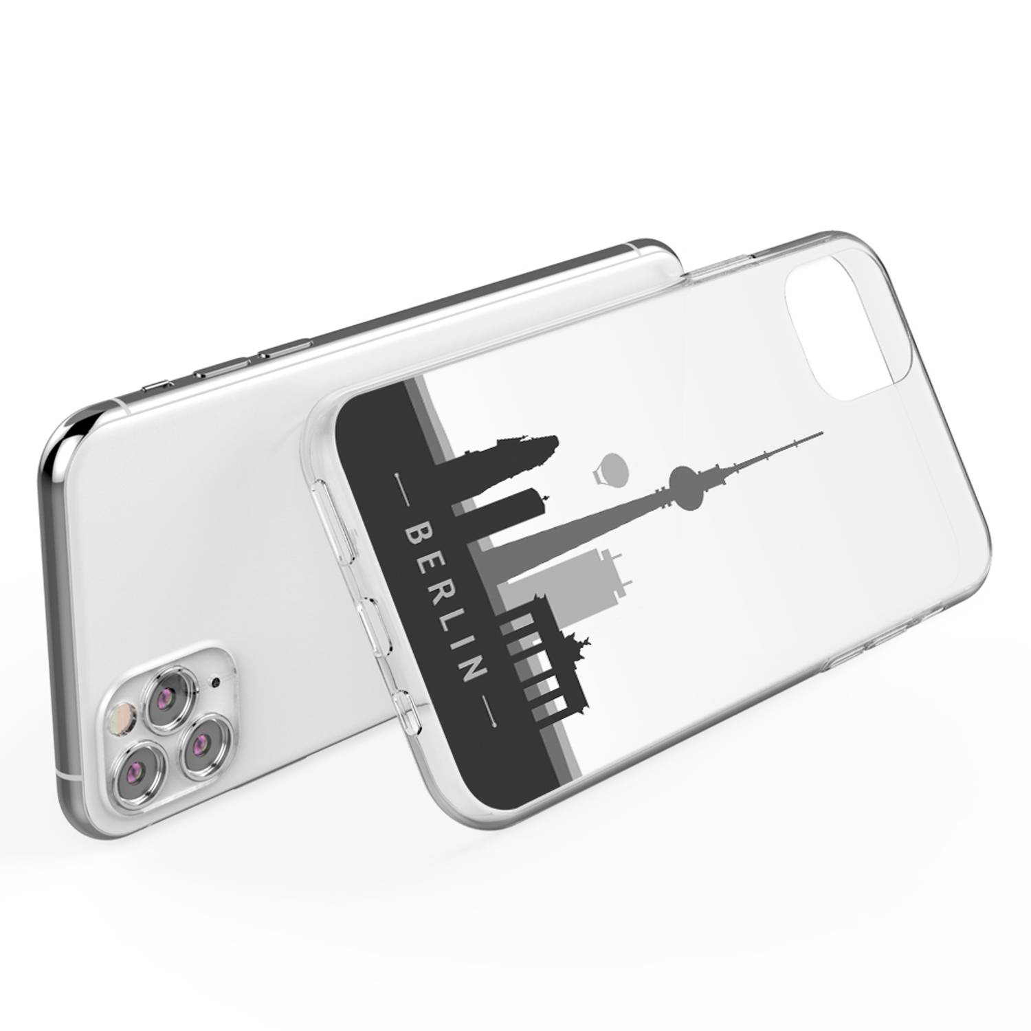 Transparente Handyhülle mit Berliner Skyline. Schwarze Silhouette auf weißem Hintergrund. Telefon daneben.