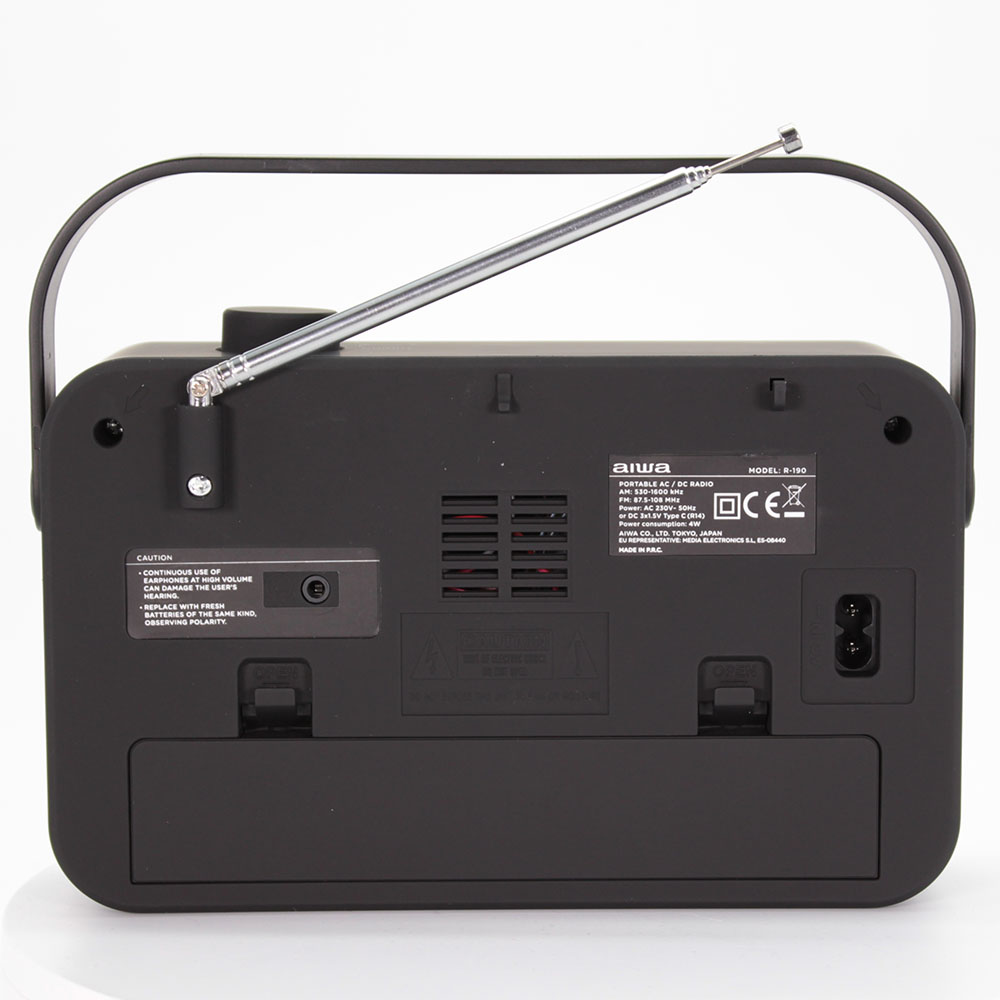 Tył czarnego radia AIWA z anteną i uchwytem.