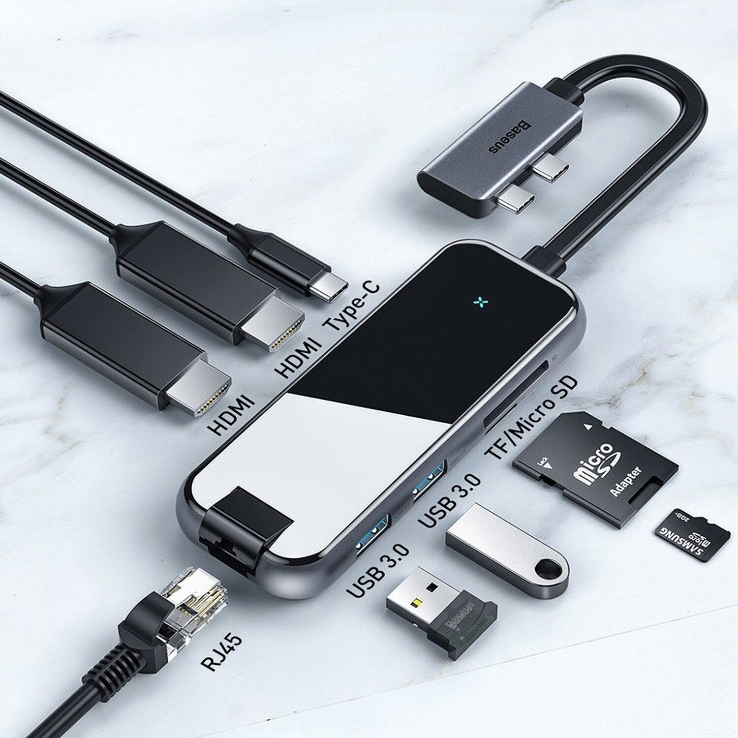 USB-Hub mit mehreren Anschlüssen. Enthält HDMI-, USB- und SD-Kartensteckplätze. Kabel und USB-Laufwerk ebenfalls gezeigt.