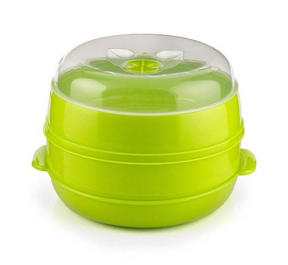 Vaporera verde de dos niveles con tapa transparente, sobre fondo blanco.