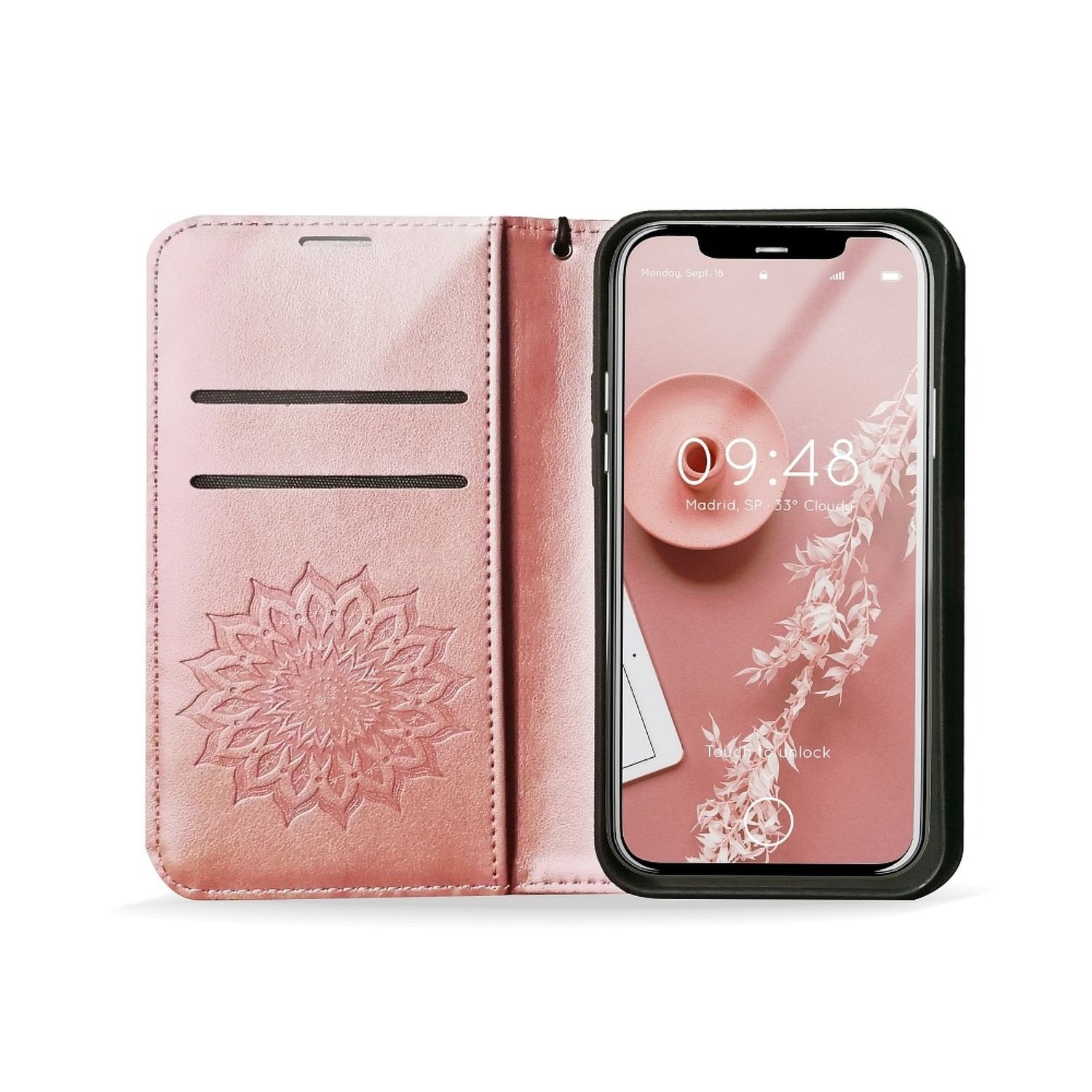 Eine pinkfarbene Handyhülle, geöffnet mit einem Telefon darin. Die Hülle hat ein Blumendesign.