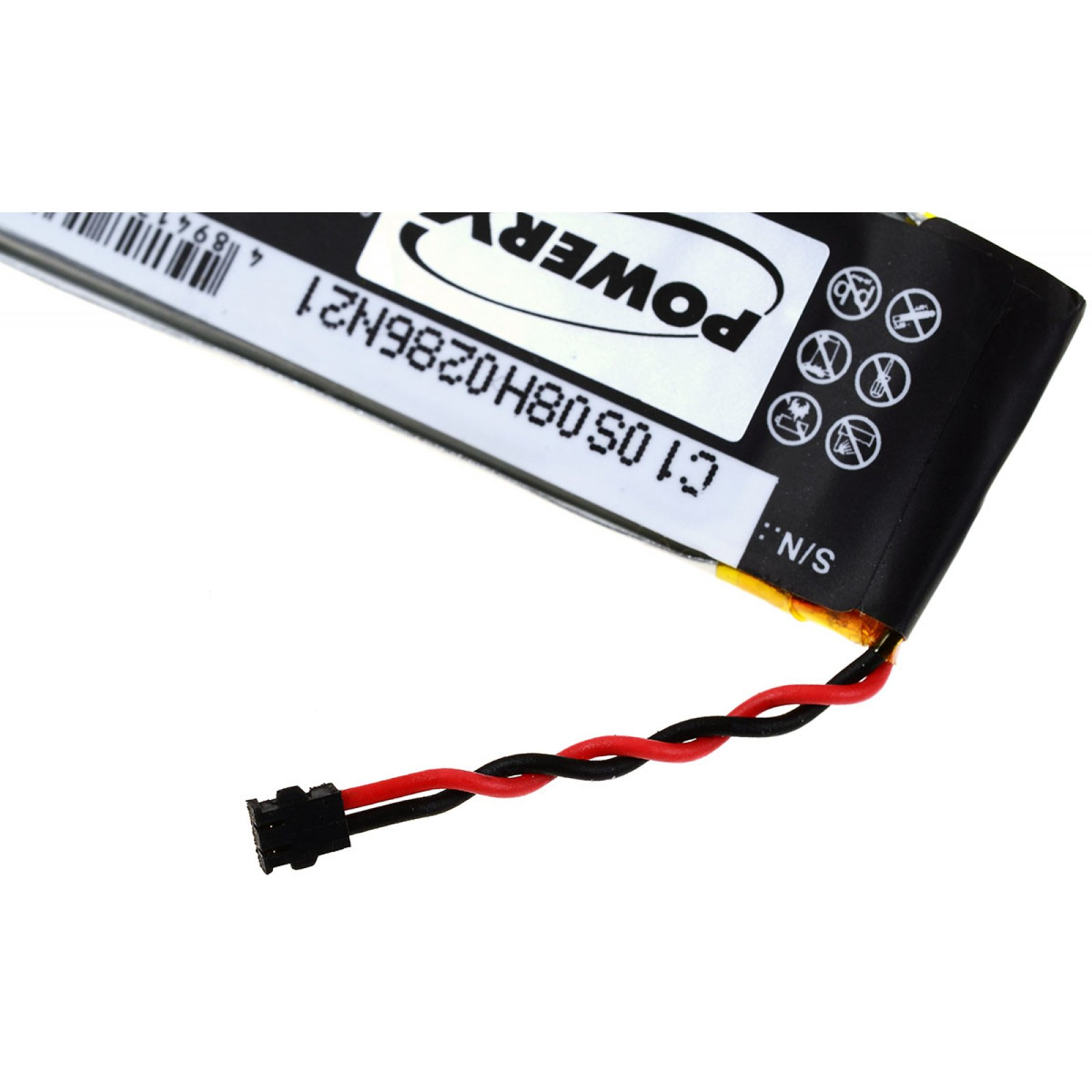 Una batería de cable negro y rojo. Tiene una etiqueta blanca con texto y un conector negro.