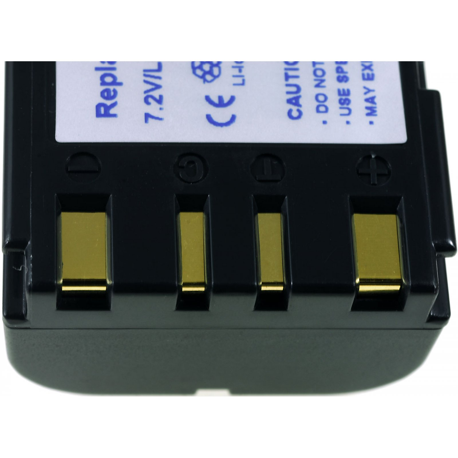 Eine schwarze Batterie mit goldenen Anschlüssen und Warnhinweisen oben.
