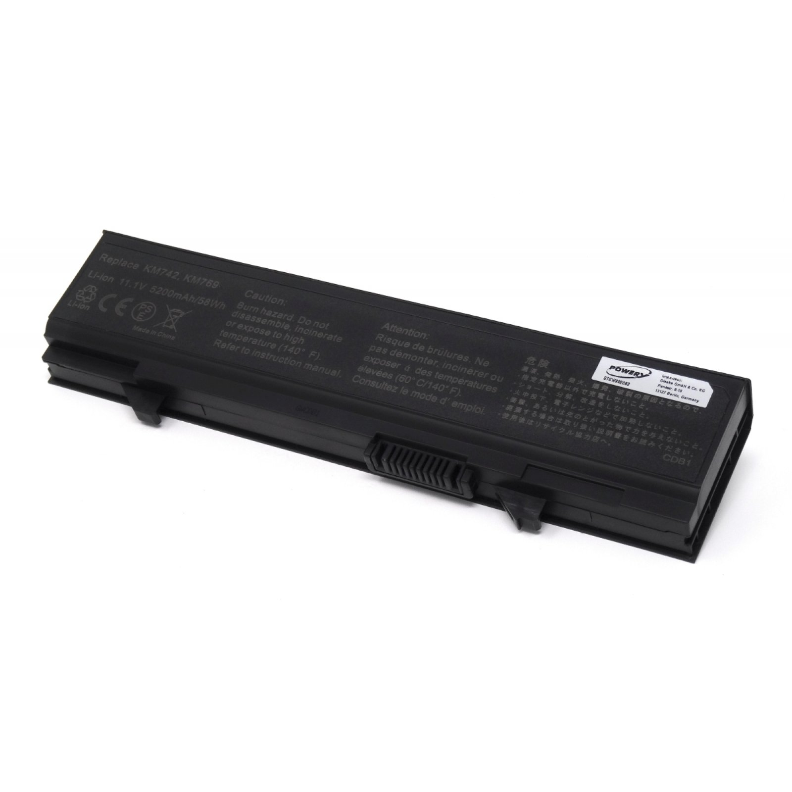 Batería de portátil. Negro y rectangular con etiquetas. Tiene texto de advertencia en varios idiomas.
