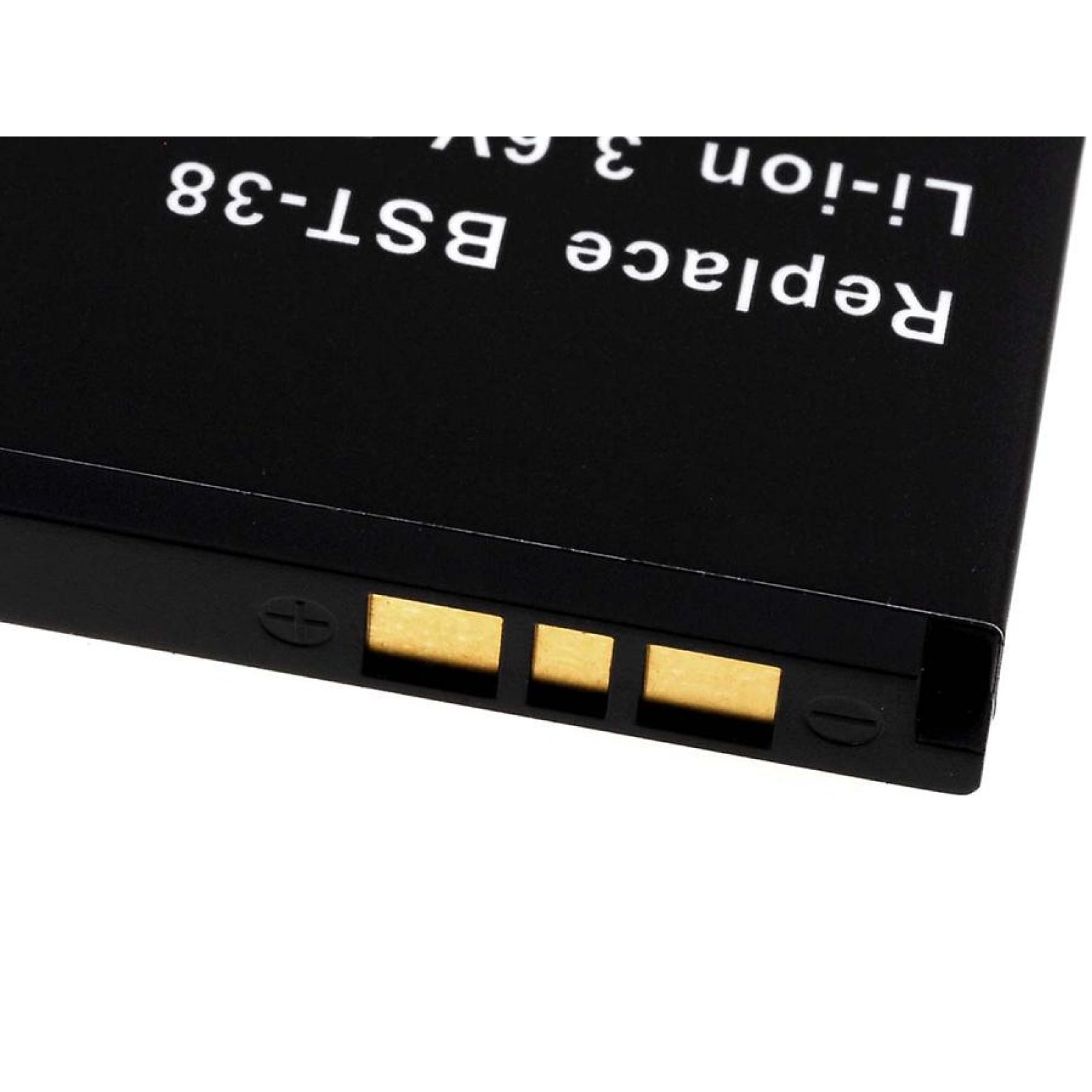 Batería negra con contactos dorados. Texto 'Replace BST-38 Li-ion 3.6V' visible.