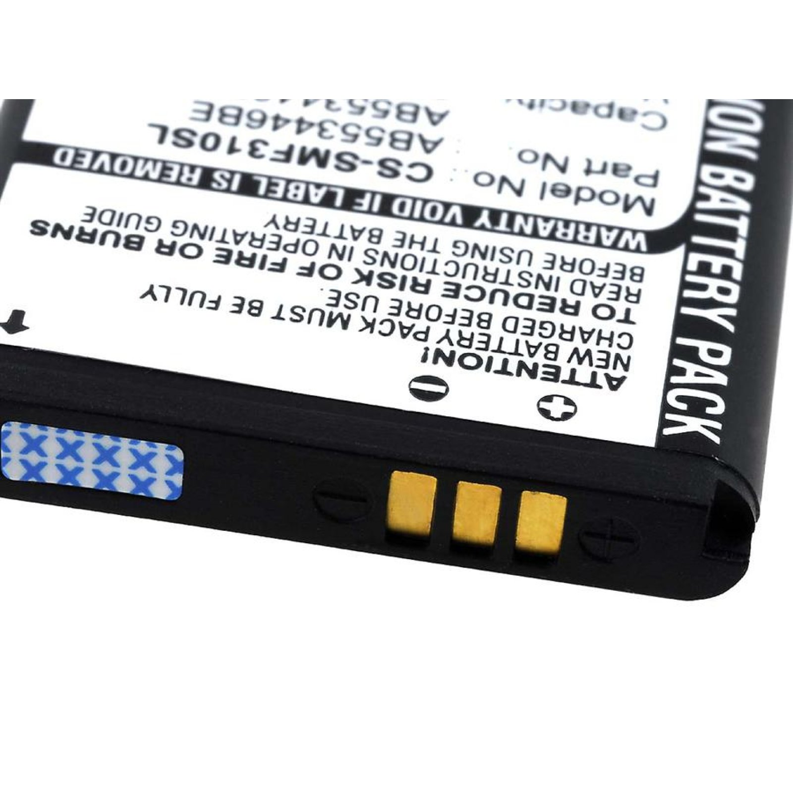 Primer plano de una batería con etiquetas de precaución y un conector.