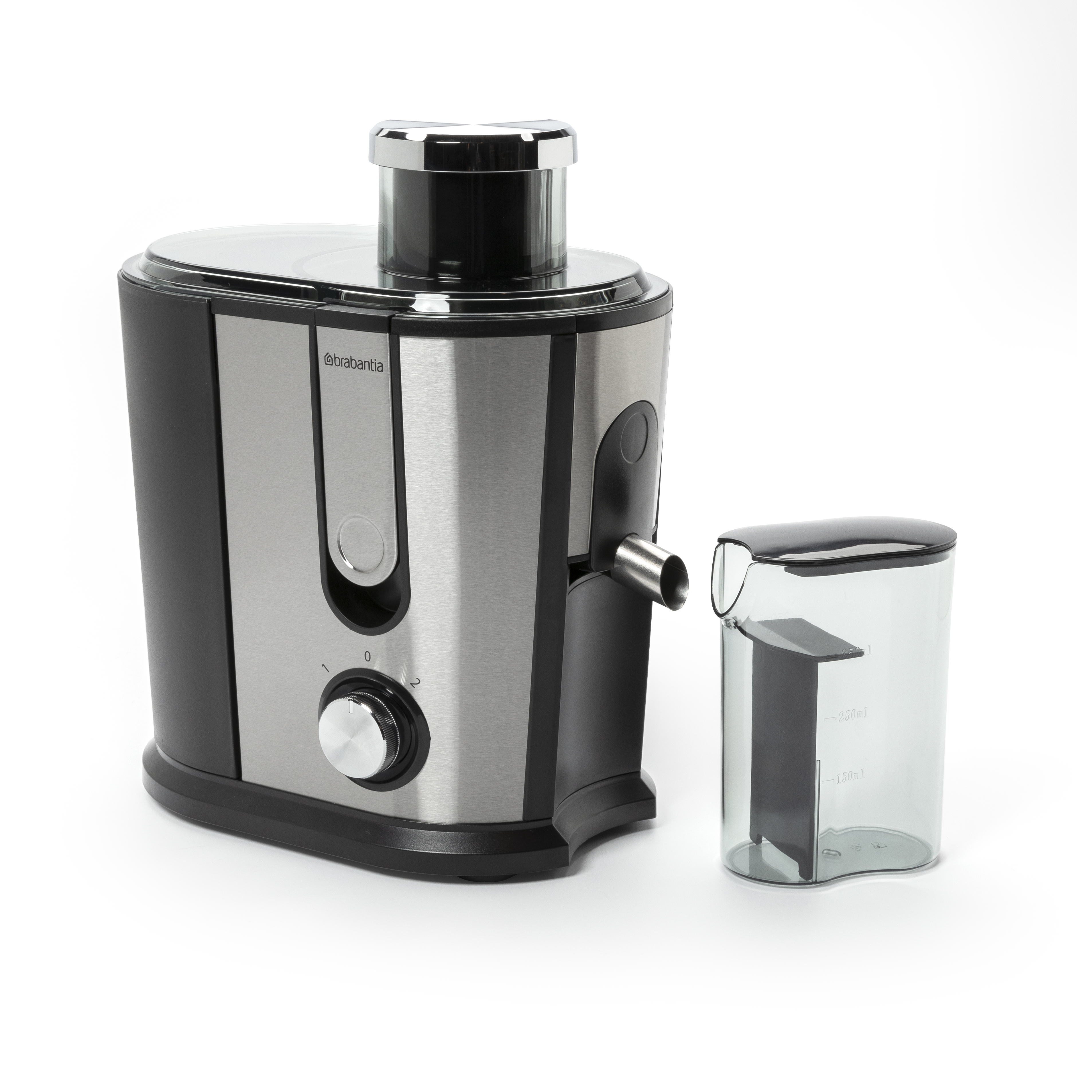 A juicer, silver and black, with a clear pitcher beside it, on a white surface.