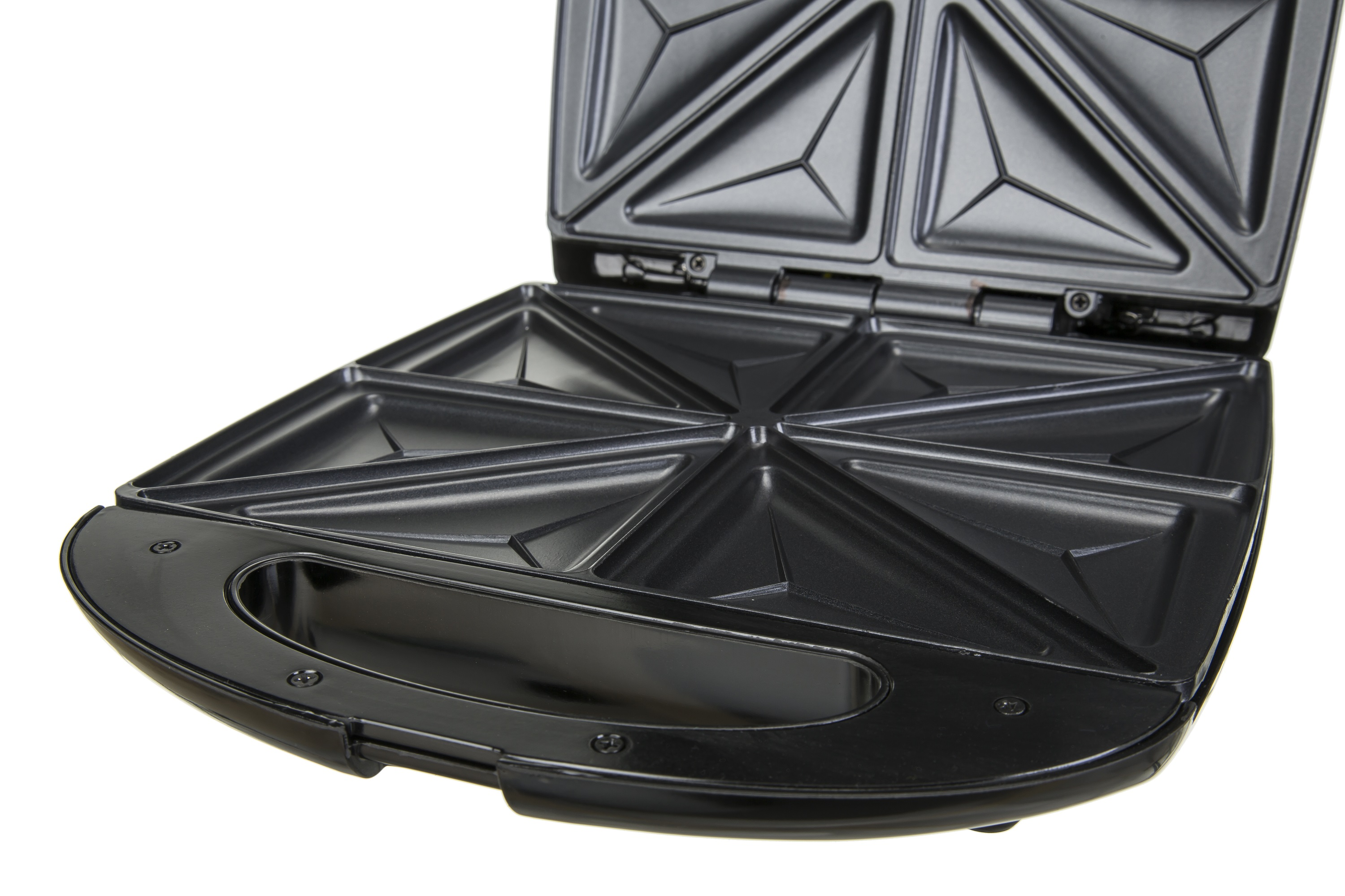 An open black sandwich maker. It has triangular molds for the sandwiches.