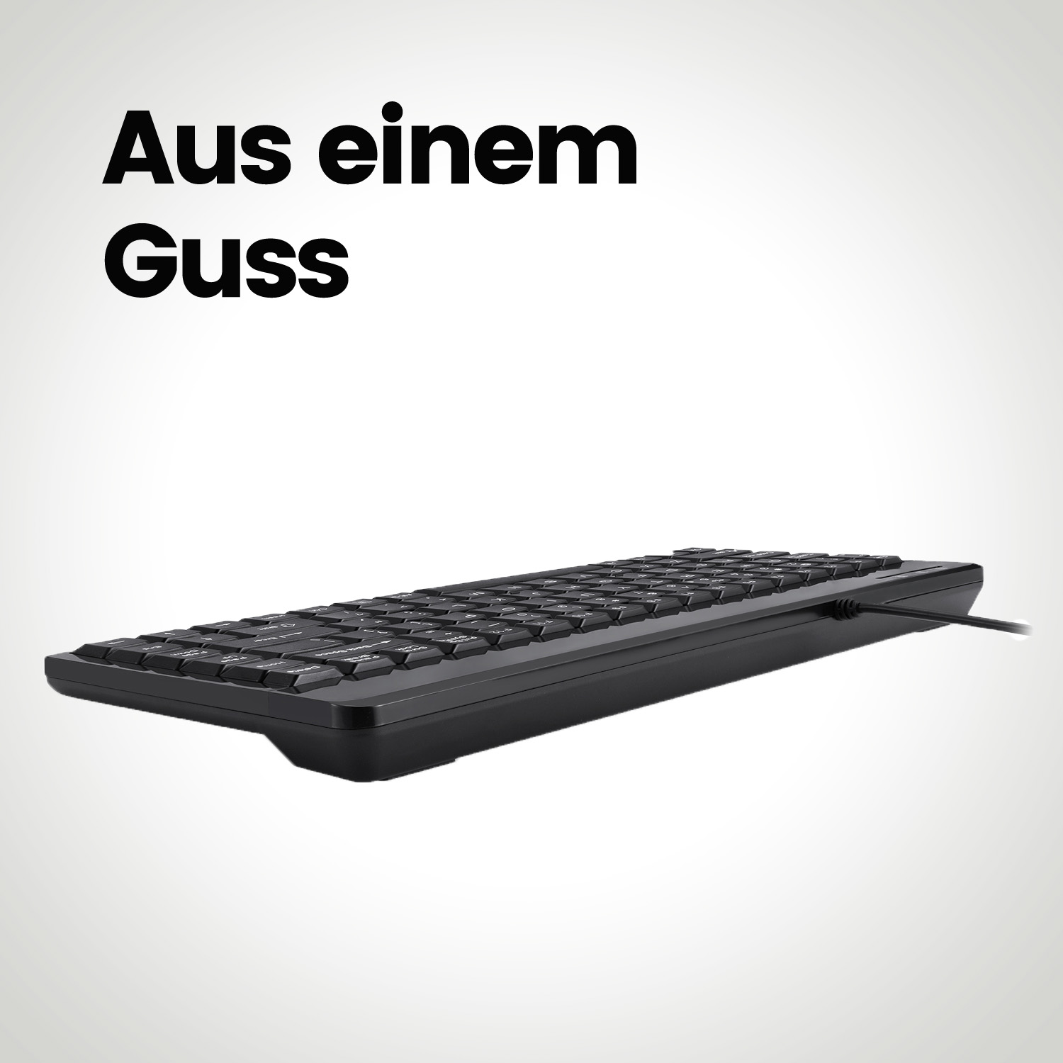Schwarze Tastatur auf weißem Hintergrund. Oben steht das Wort 'Aus einem Guss'.