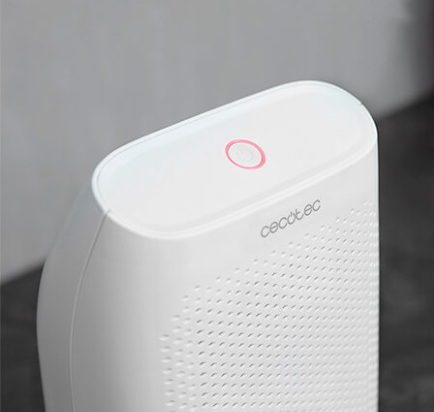 Biały oczyszczacz powietrza z różowym światłem na górze. Widoczne logo marki.