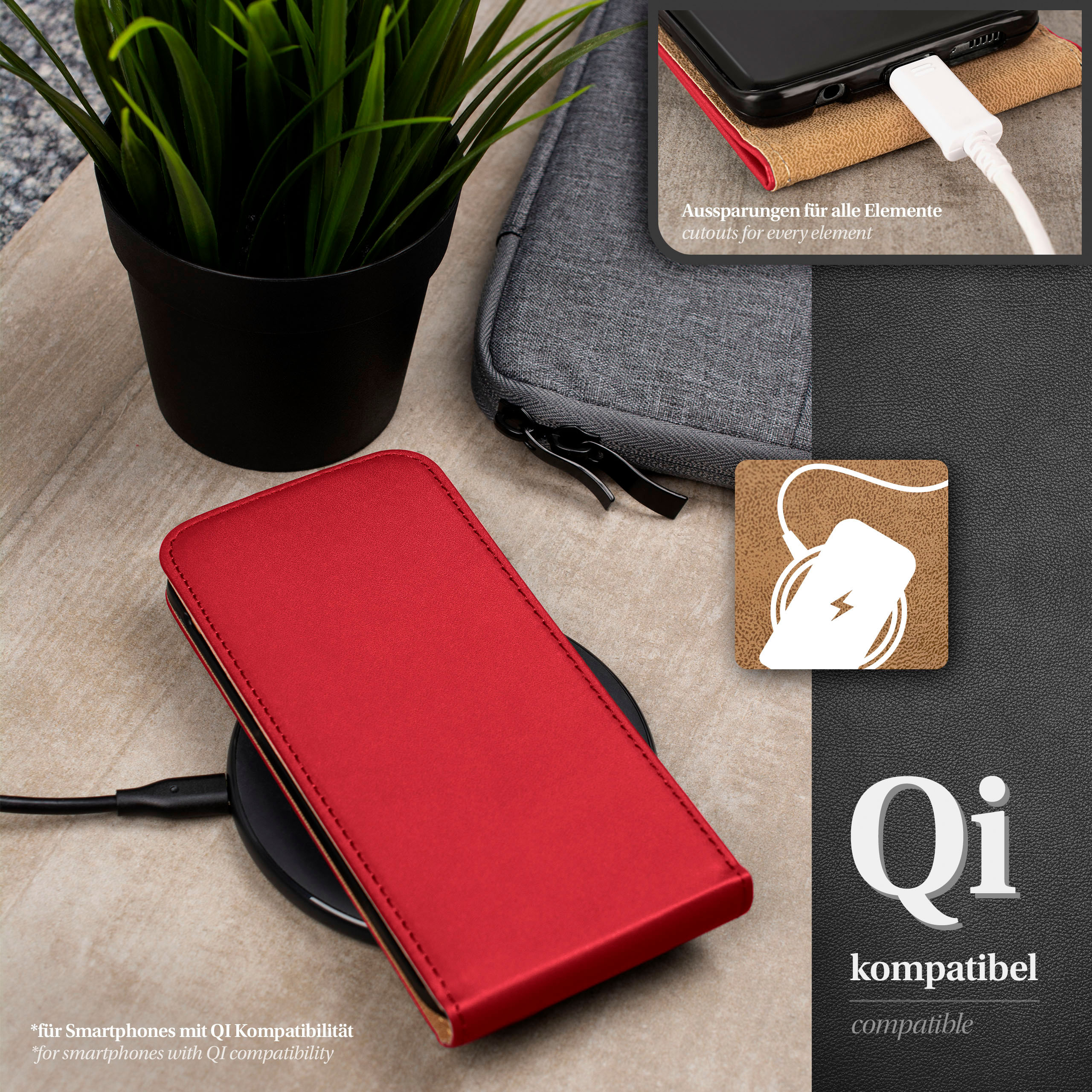 Rotes Smartphone-Etui wird geladen. Schwarze Basis, rotes Etui, Telefon und eine Pflanze.
