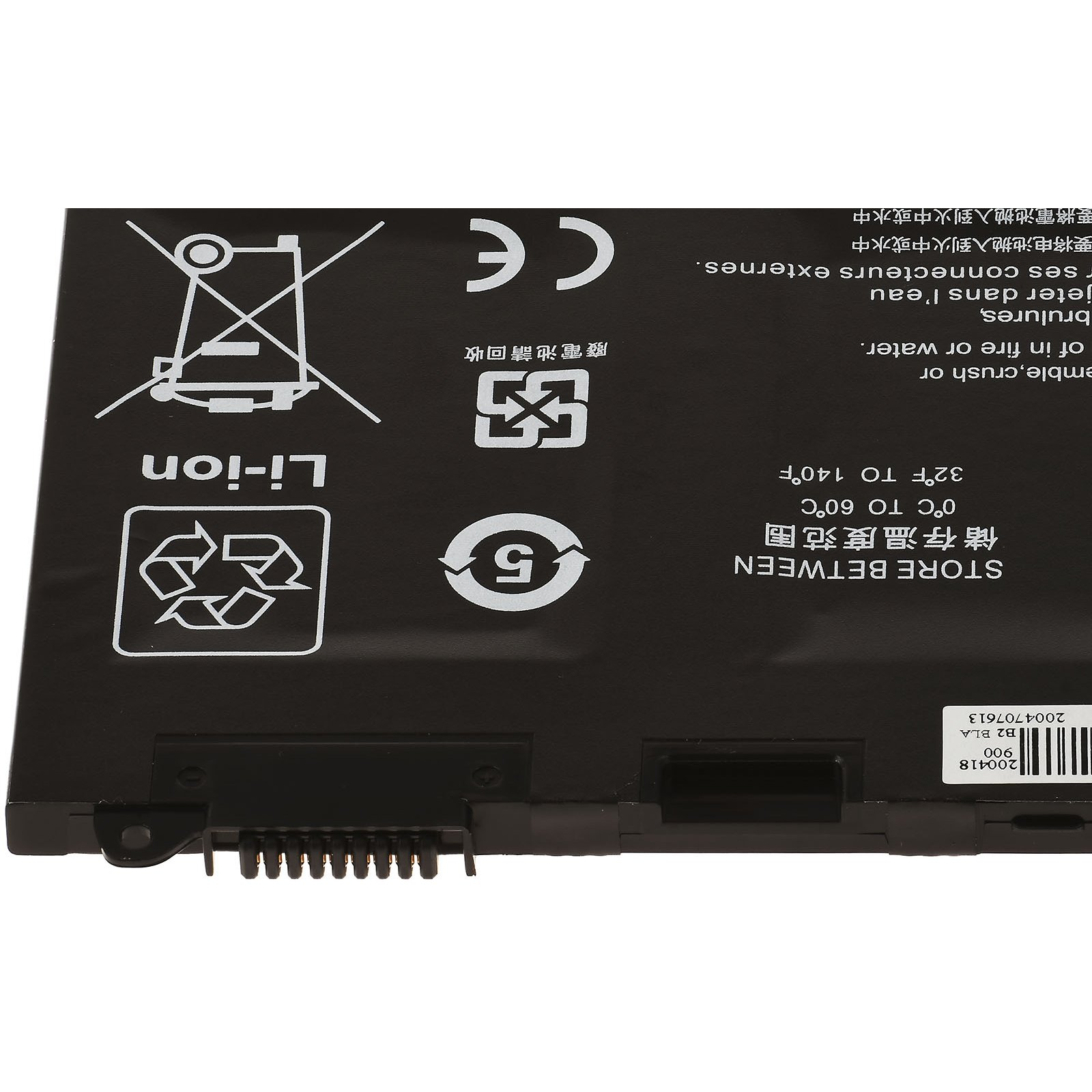 Una batería negra para portátil con símbolos de advertencia y texto.