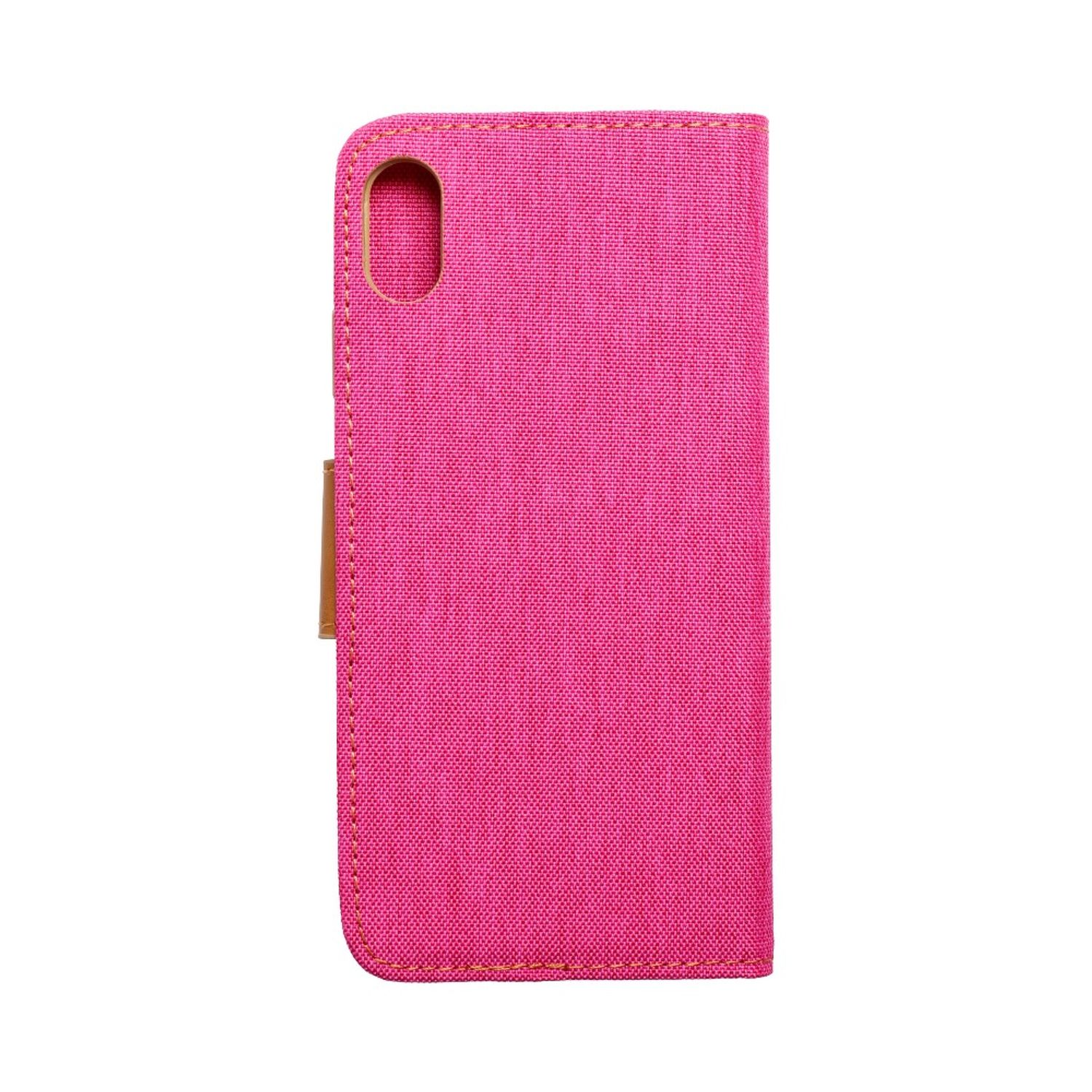 Nahaufnahme einer rosa Handyhülle mit Telefonform. Die Hülle ist geschlossen.