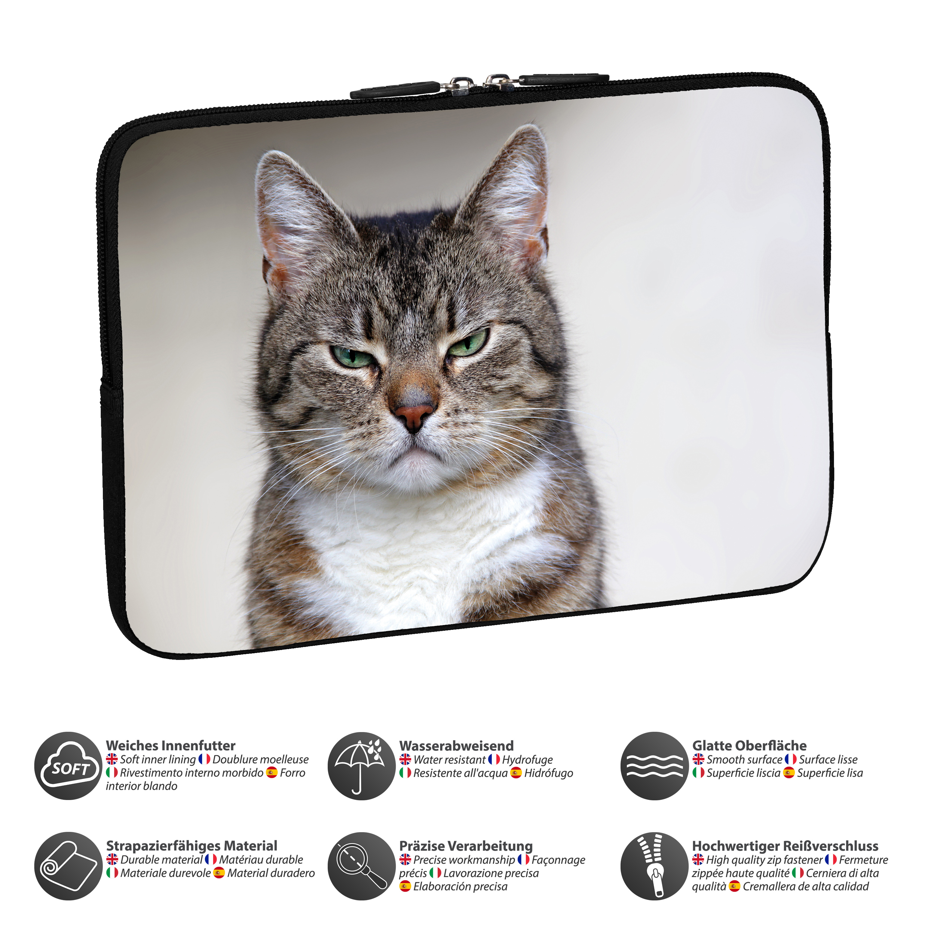 Katzenporträt auf einer Laptoptasche. Die Katze hat grüne Augen.