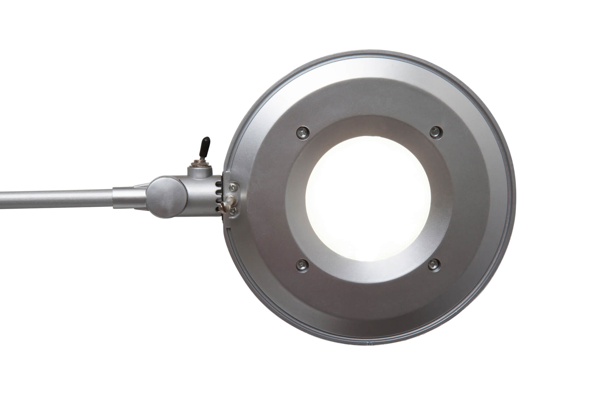 Srebrna okrągła lampa powiększająca z białym źródłem światła. Lampa na białym tle.