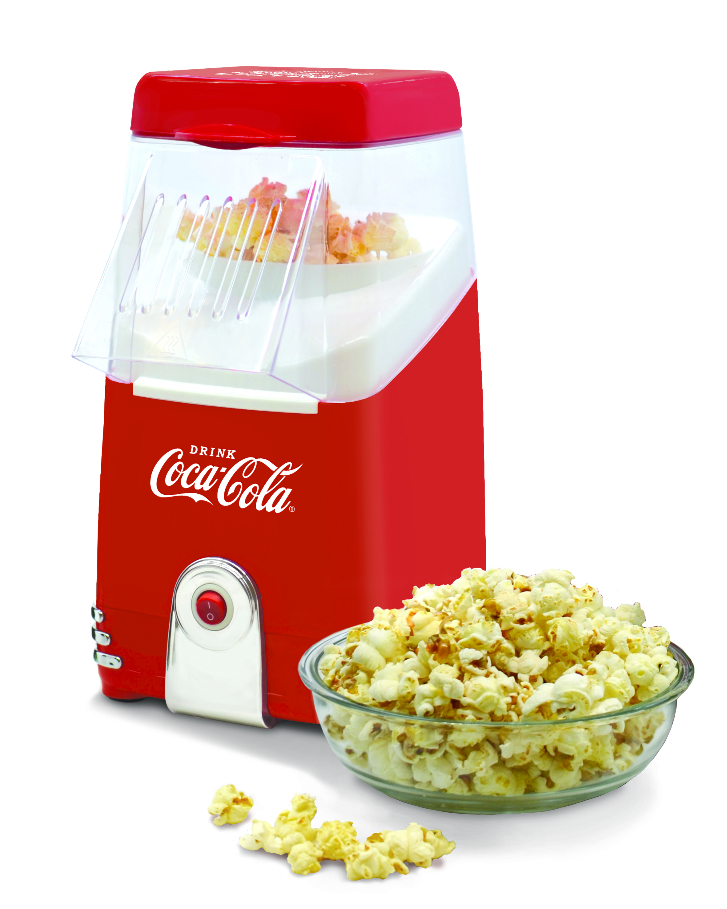 Rote Coca-Cola Popcornmaschine mit Popcorn in einer Schüssel. Popcorn ist auch in der Maschine.