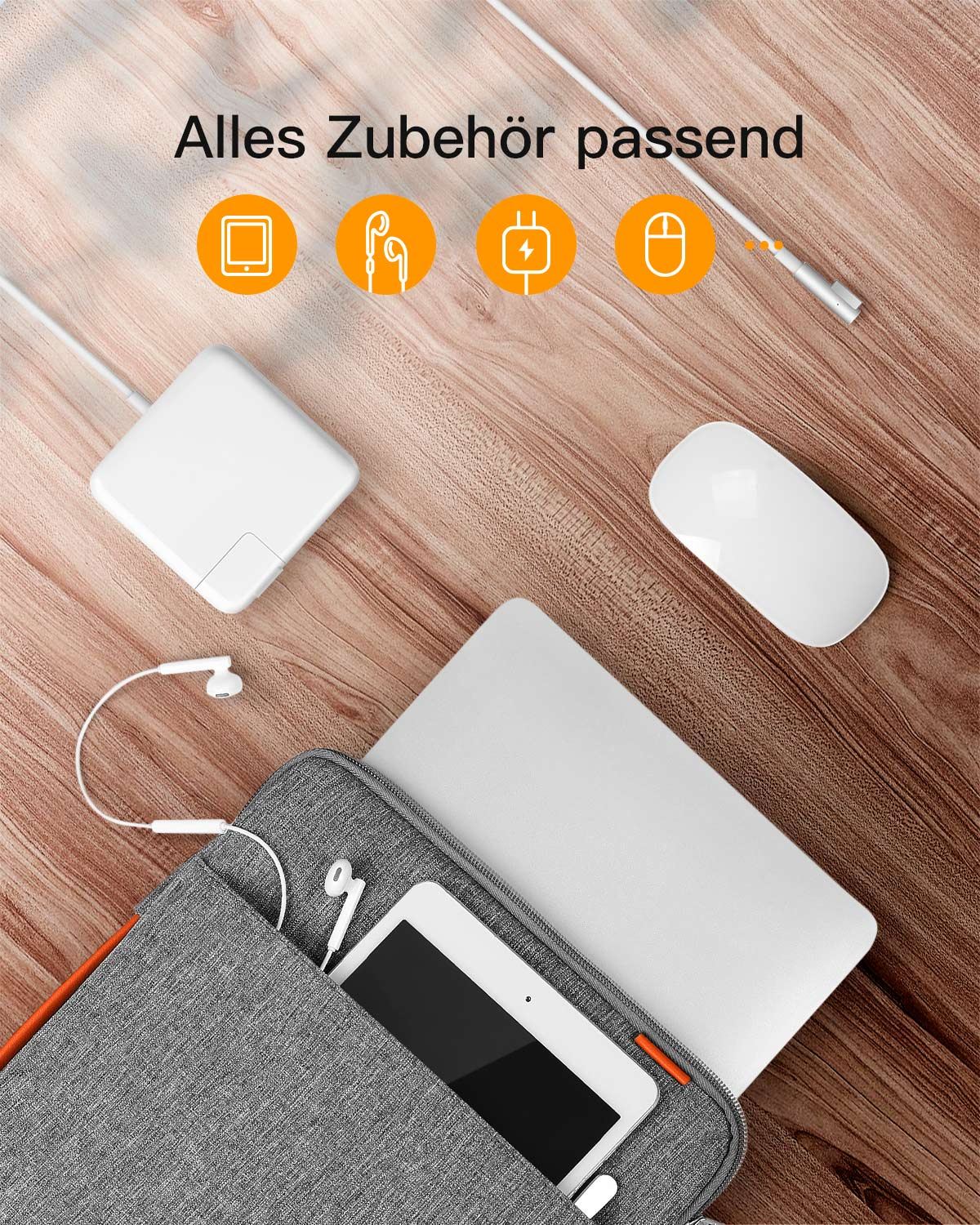 Ein Laptop, Tablet, Maus, Adapter und Ohrhörer auf einem Holztisch.