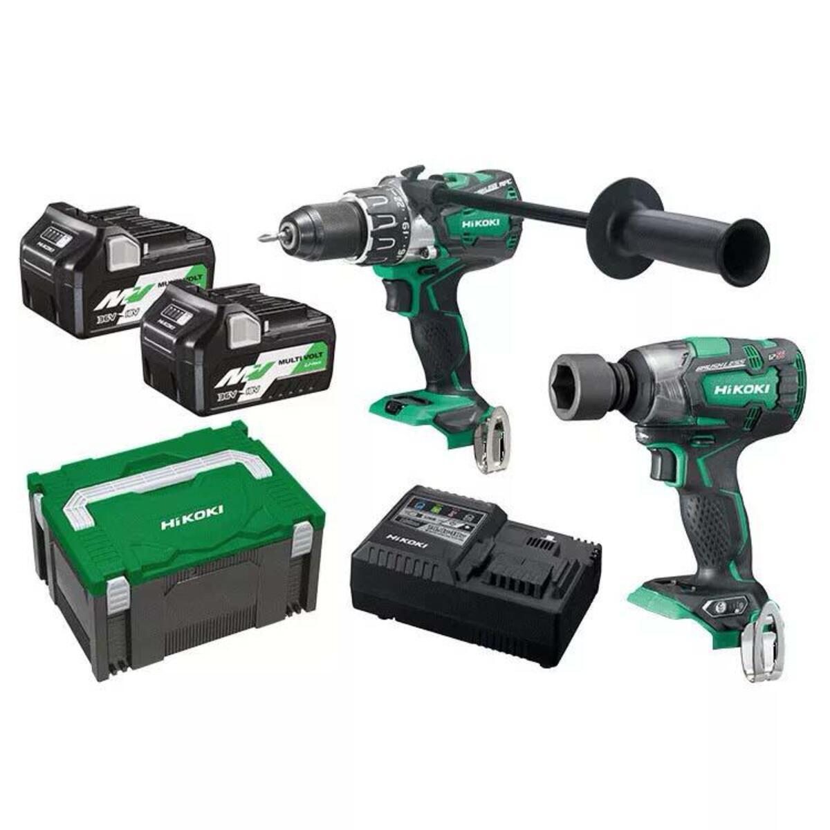 Set di utensili elettrici: trapano, avvitatore a impulsi, batterie e caricabatterie, tutto verde e nero.