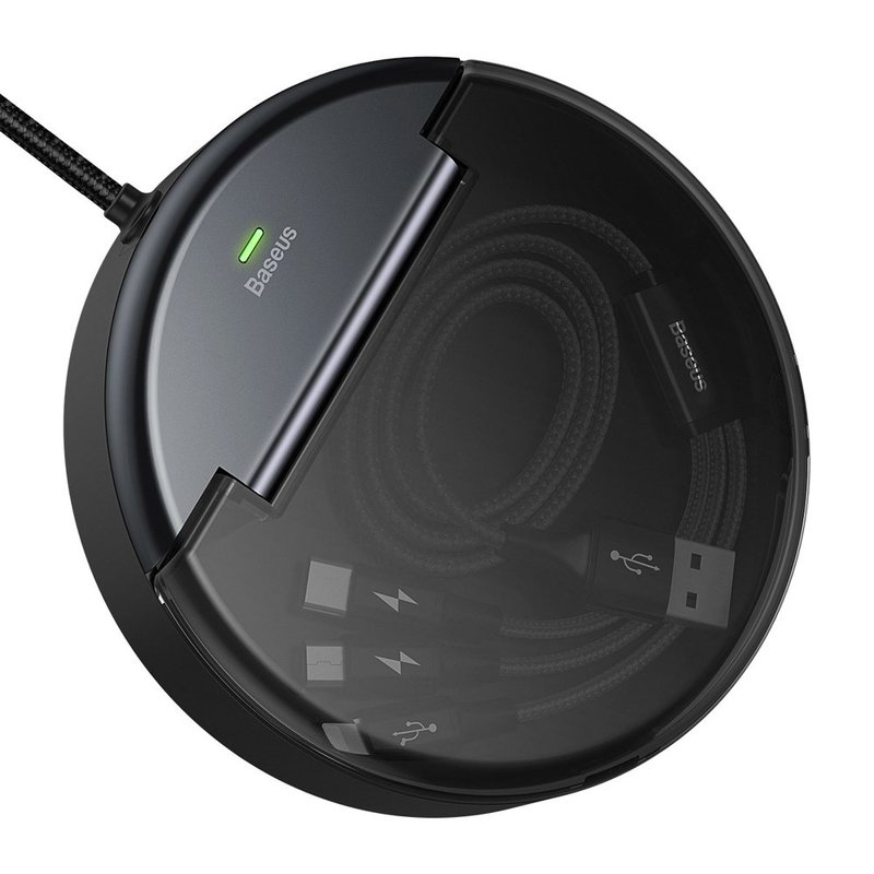 Schwarze, runde Ladestation mit Kabel, USB-Anschlüssen und grüner Anzeige.