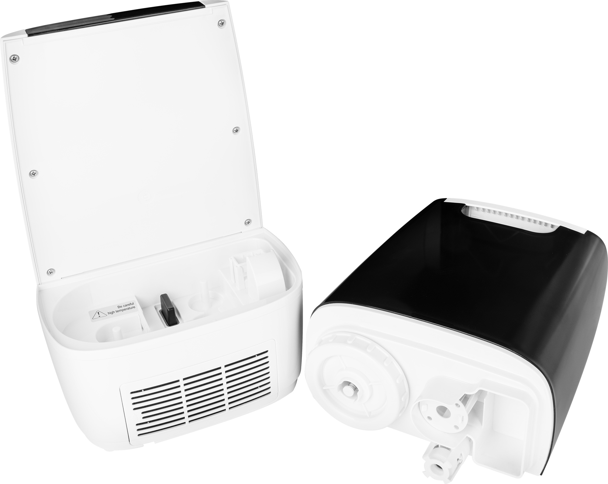 Dwie białe części nawilżacza. Jedna jest otwarta, druga czarno-biała.