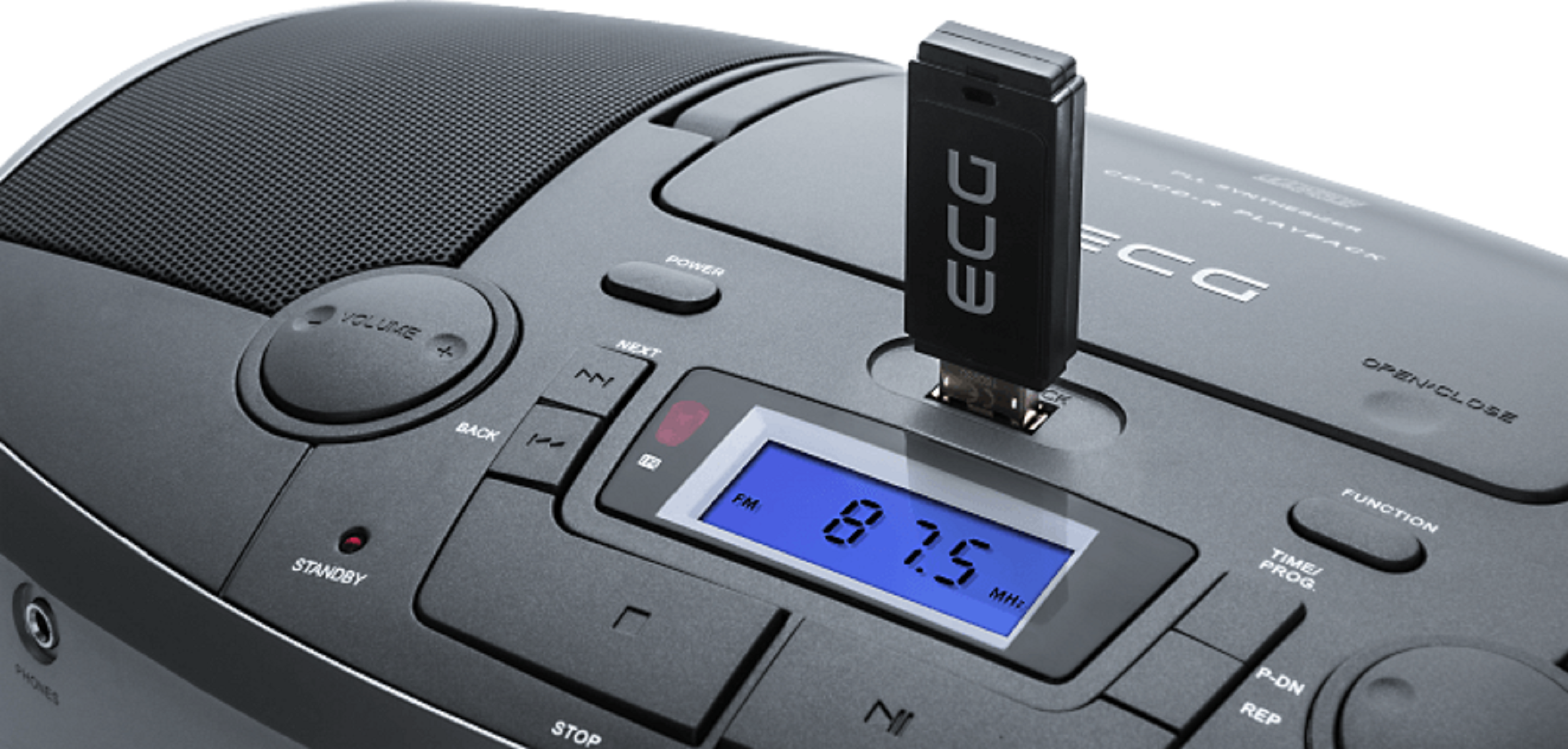 Ein schwarz-graues Radio mit eingestecktem USB-Stick, das 87,5 FM auf dem Bildschirm anzeigt.