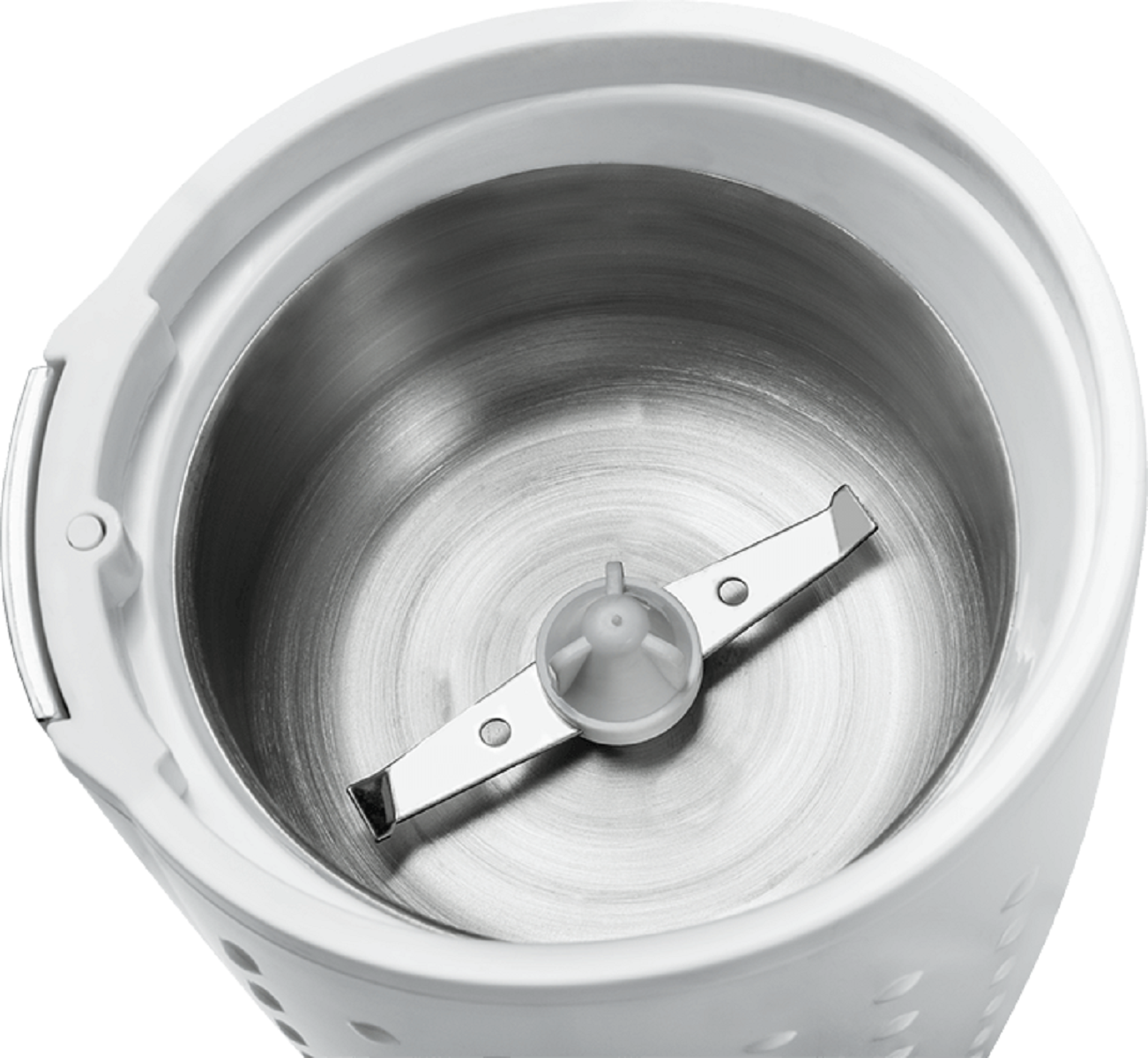 Biały młynek do kawy z ostrzem w środku.