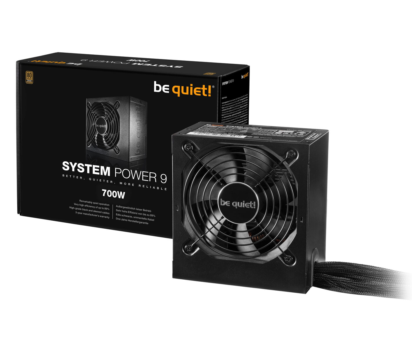 Ein schwarzes Computer-Netzteil mit Lüfter und eine Box mit dem 'be quiet!'-Logo.