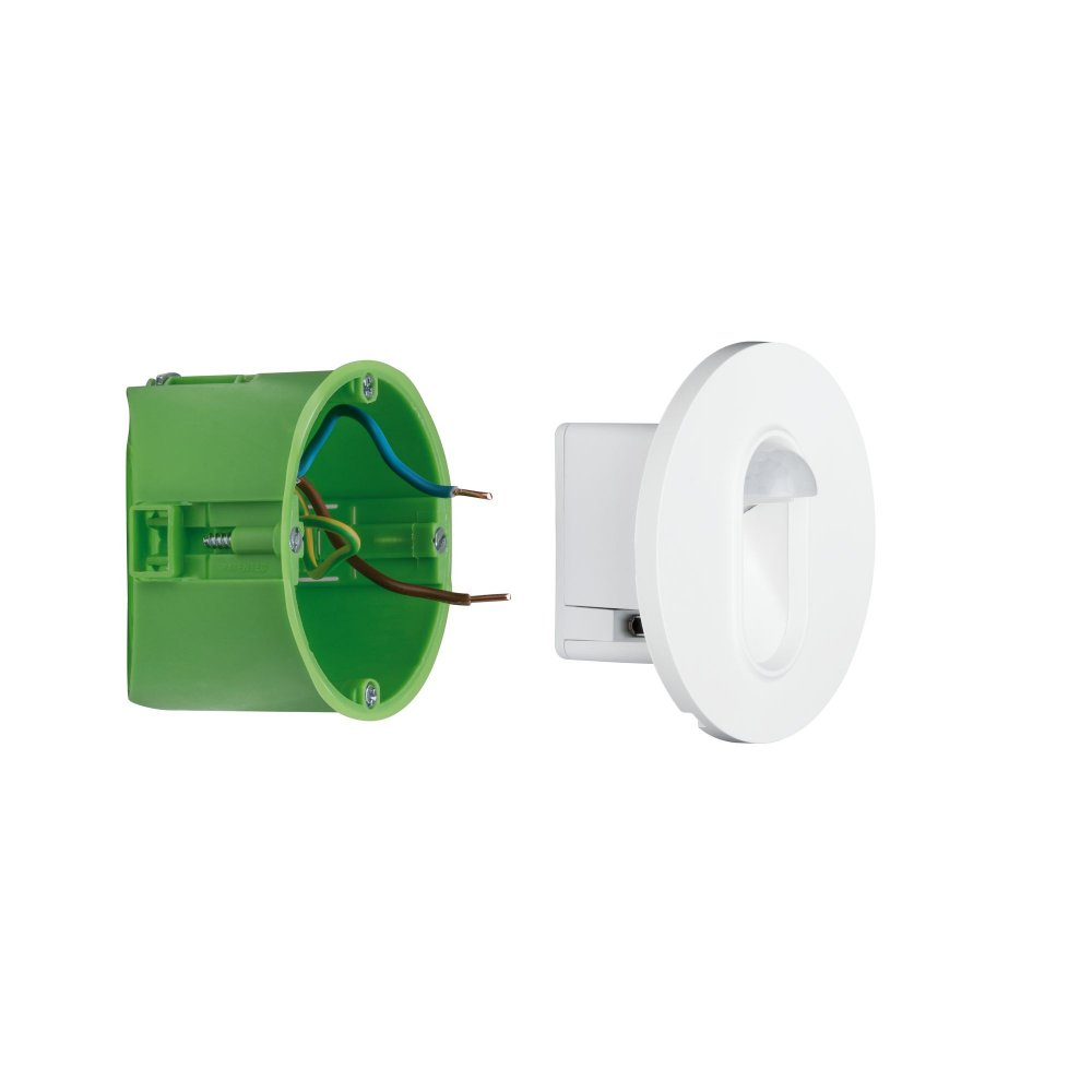 Scatola di giunzione elettrica verde con fili e un apparecchio di illuminazione bianco, circolare, fissato a un muro.