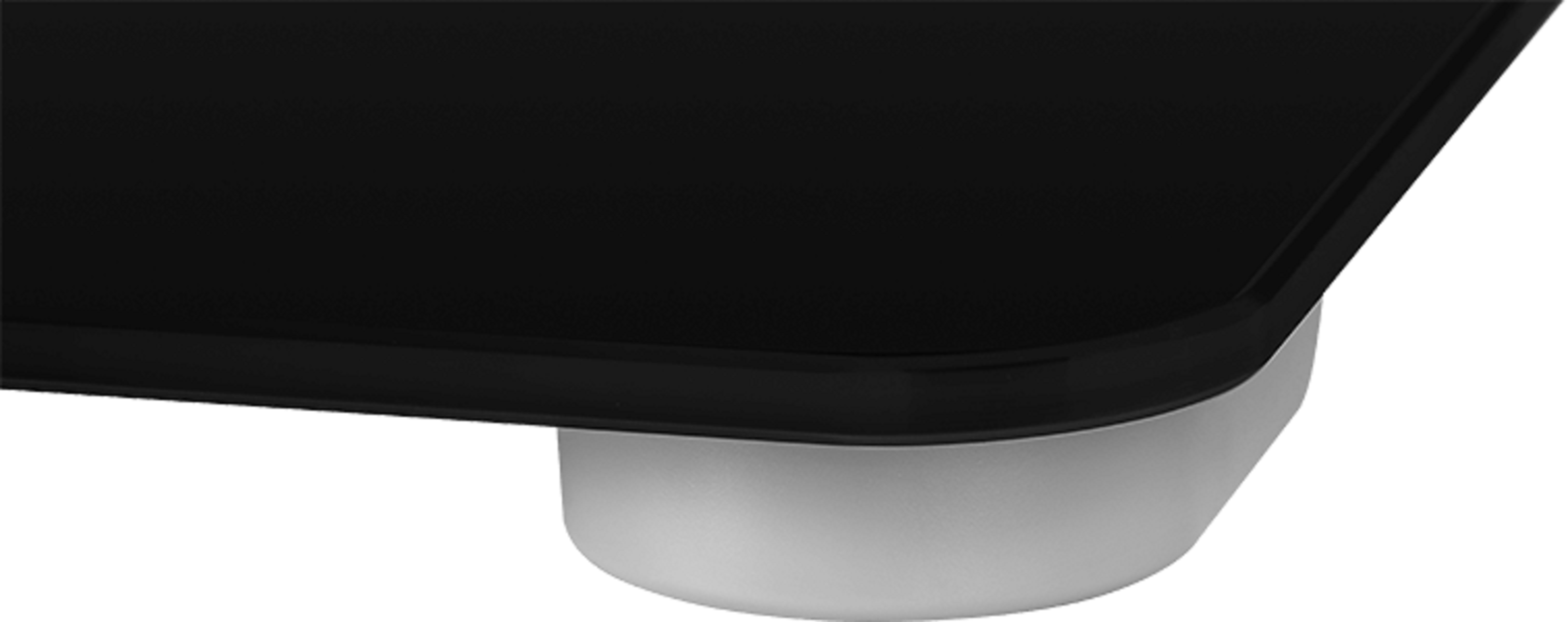 Zbliżenie czarnej wagi cyfrowej z białą podstawą. Elegancki design z zaokrąglonymi rogami.