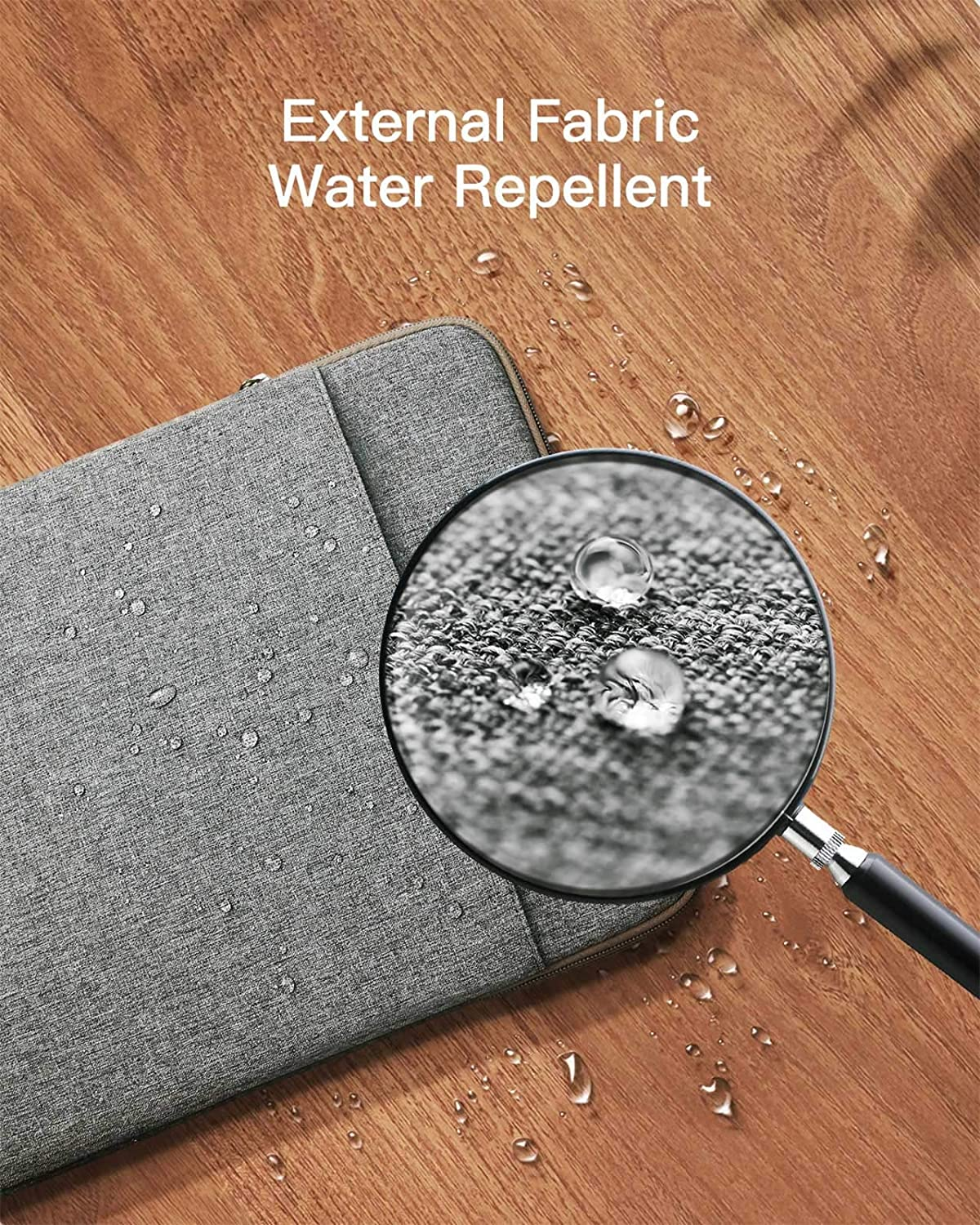 Graue Laptop-Hülle mit Wassertropfen, Nahaufnahme des Stoffes.