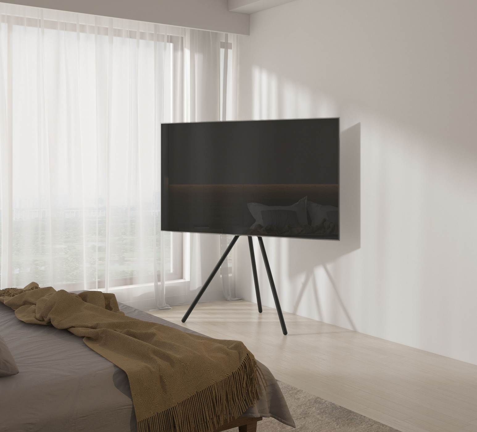 Moderner Fernseher auf Stativ in minimalistischem Schlafzimmer.