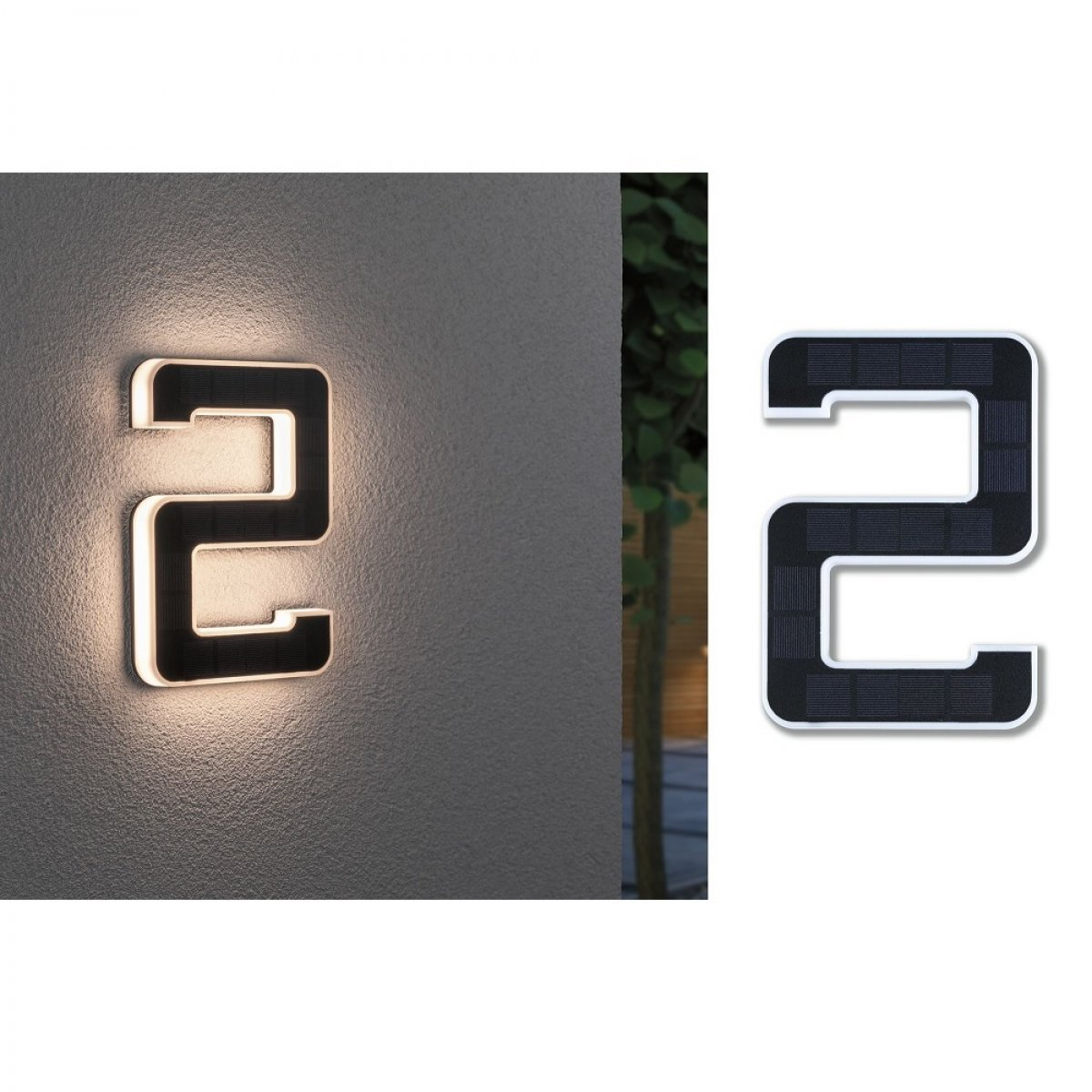 Światło ścienne zasilane energią słoneczną z numerem 2. Czarny przód, biała obwódka, zamontowane na szarej ścianie. Po prawej stronie.