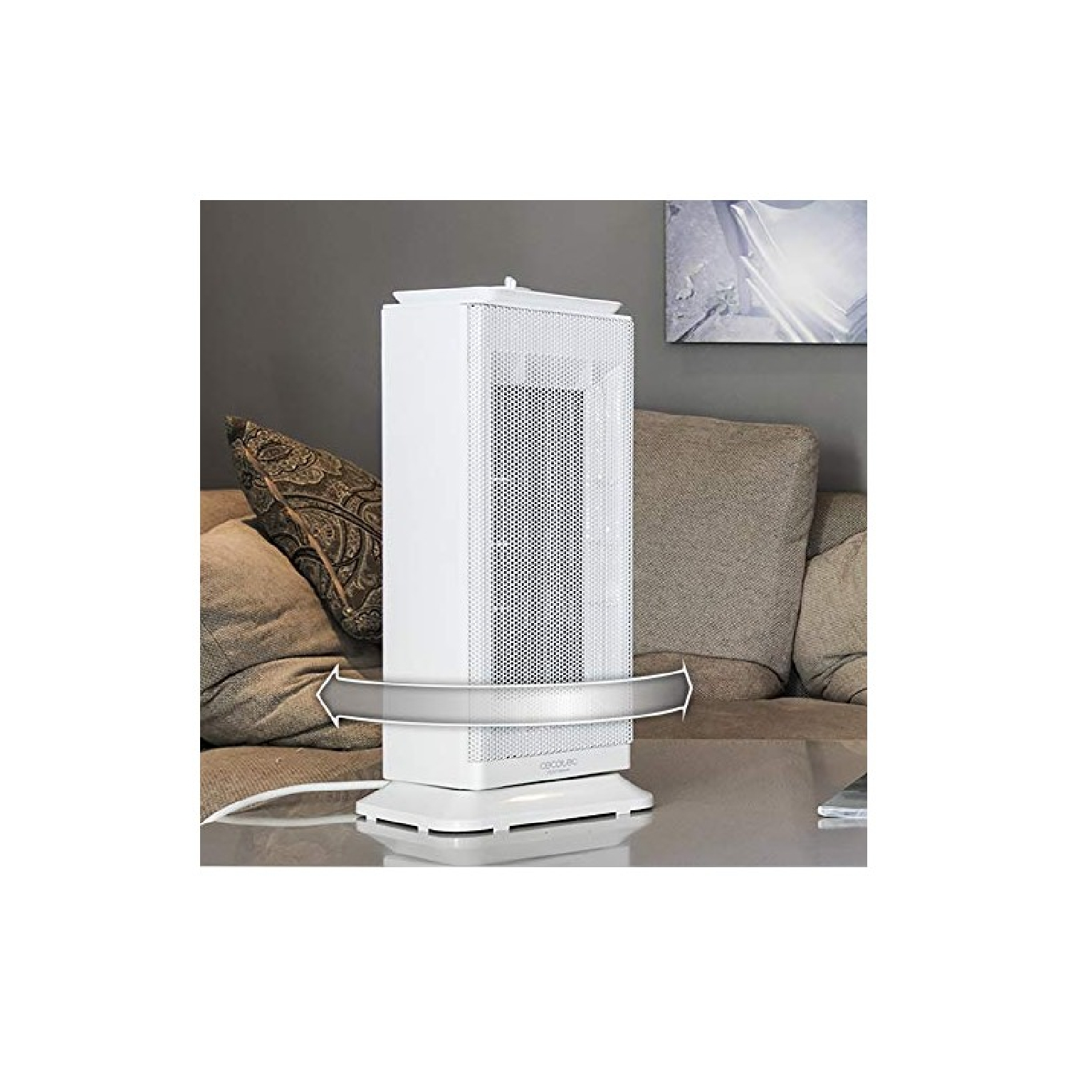 Biały oczyszczacz powietrza stoi na stole. Strzałki pokazują kierunek przepływu powietrza. W tle kanapa.