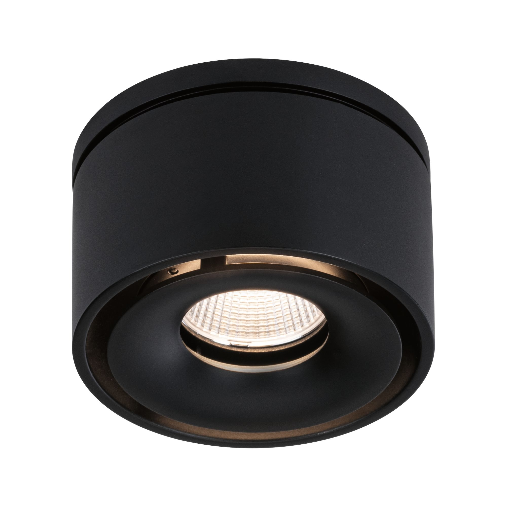 Apparecchio di illuminazione rotondo nero a incasso con sorgente luminosa centrale e anello esterno scuro.