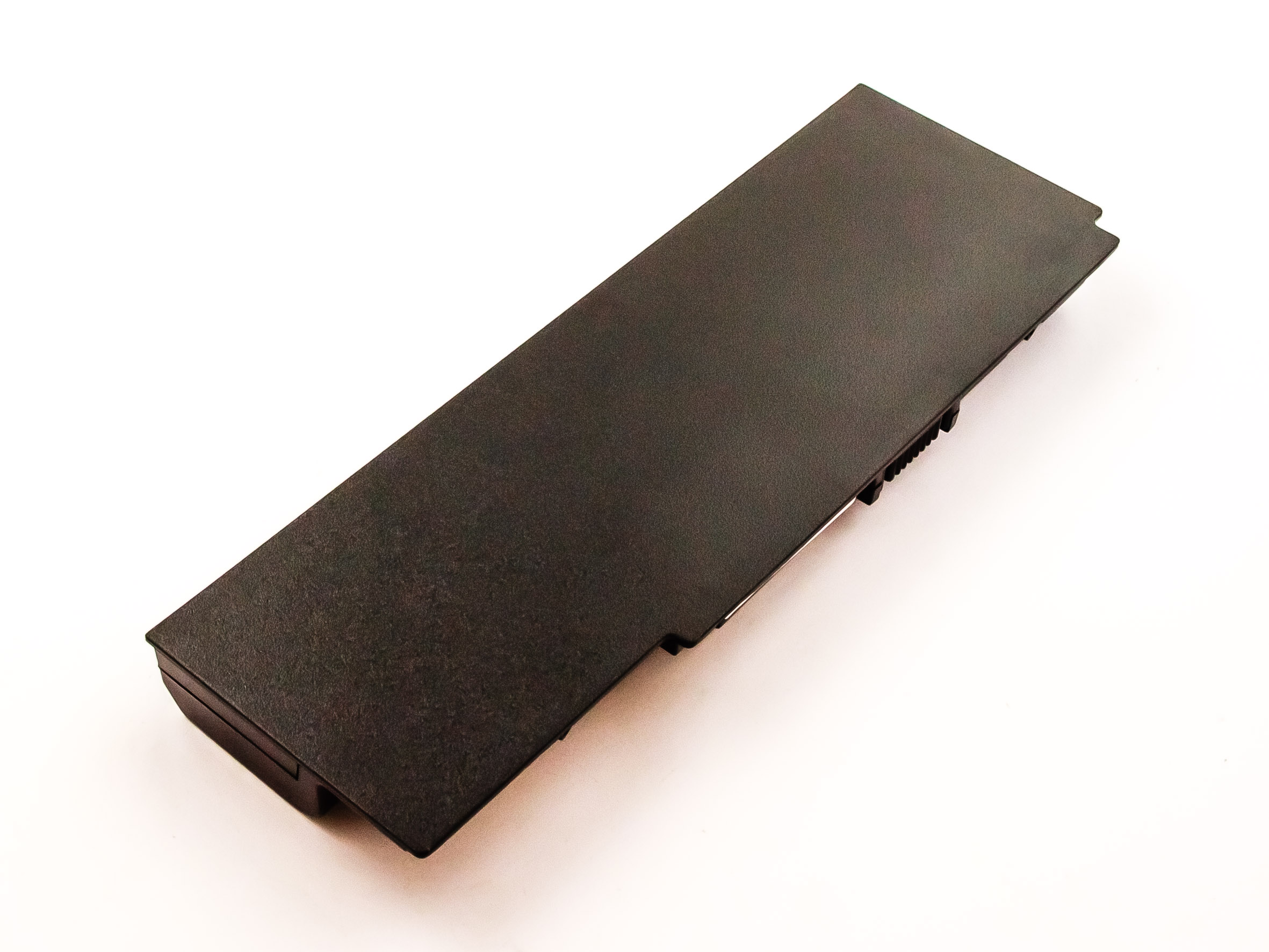 Ein schwarzer Laptop-Akku auf weißer Oberfläche. Der Akku ist rechteckig und hat eine strukturierte Oberfläche.