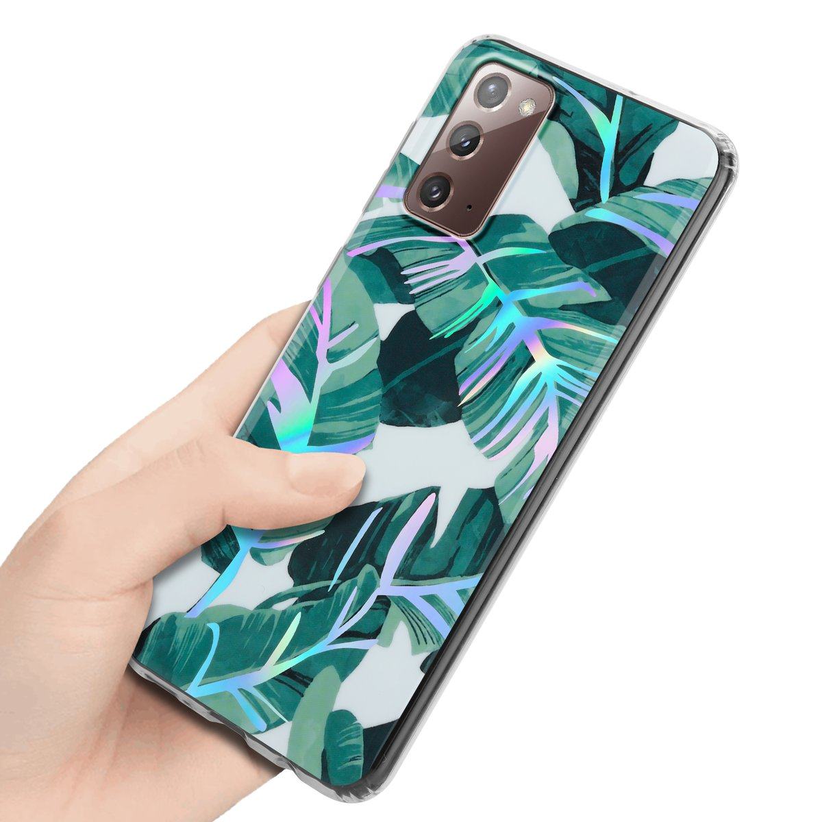 Mano che tiene una custodia per telefono con un design a foglie, sfondo verde e bianco.