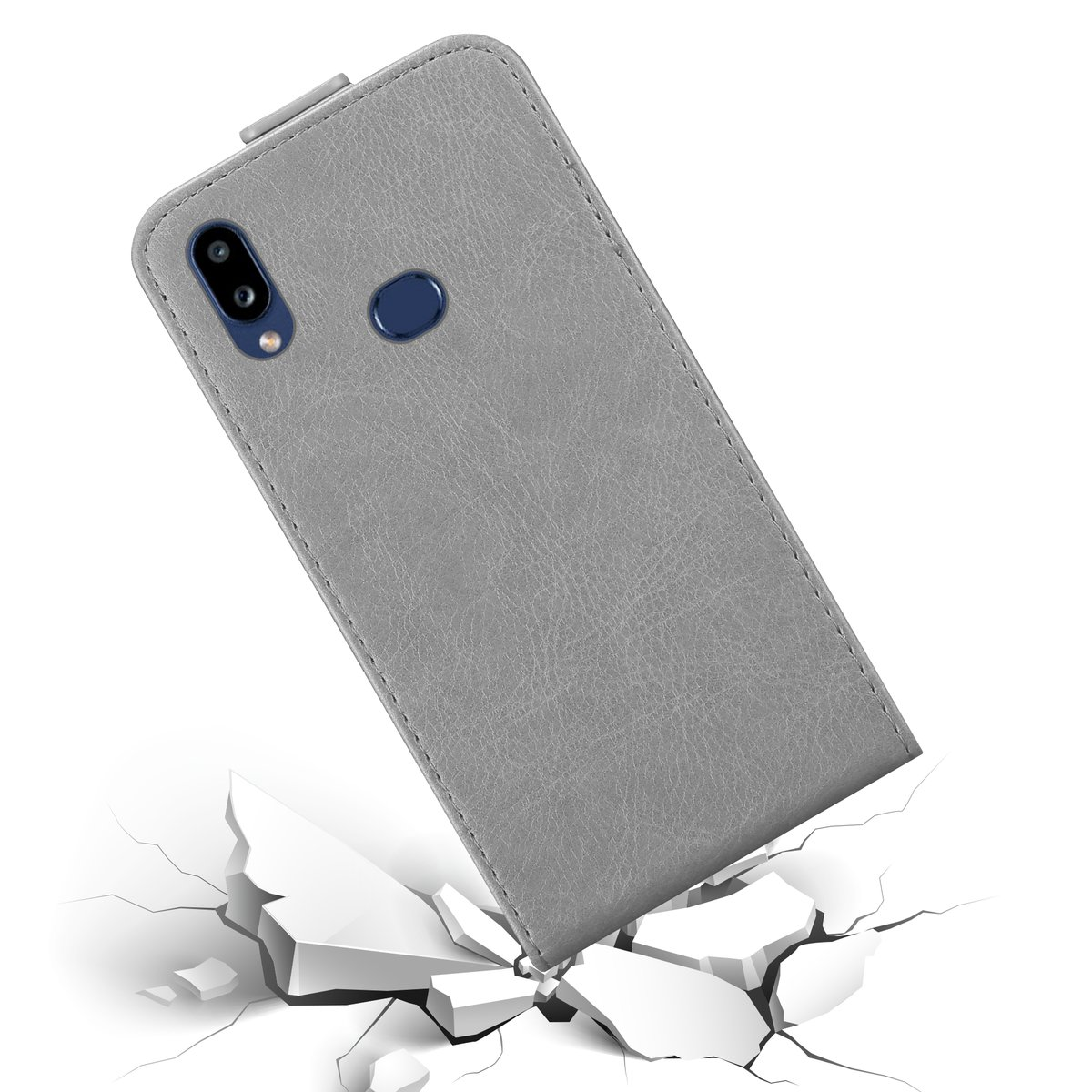 Una custodia grigia per telefono su una superficie bianca con effetto crepa in basso.