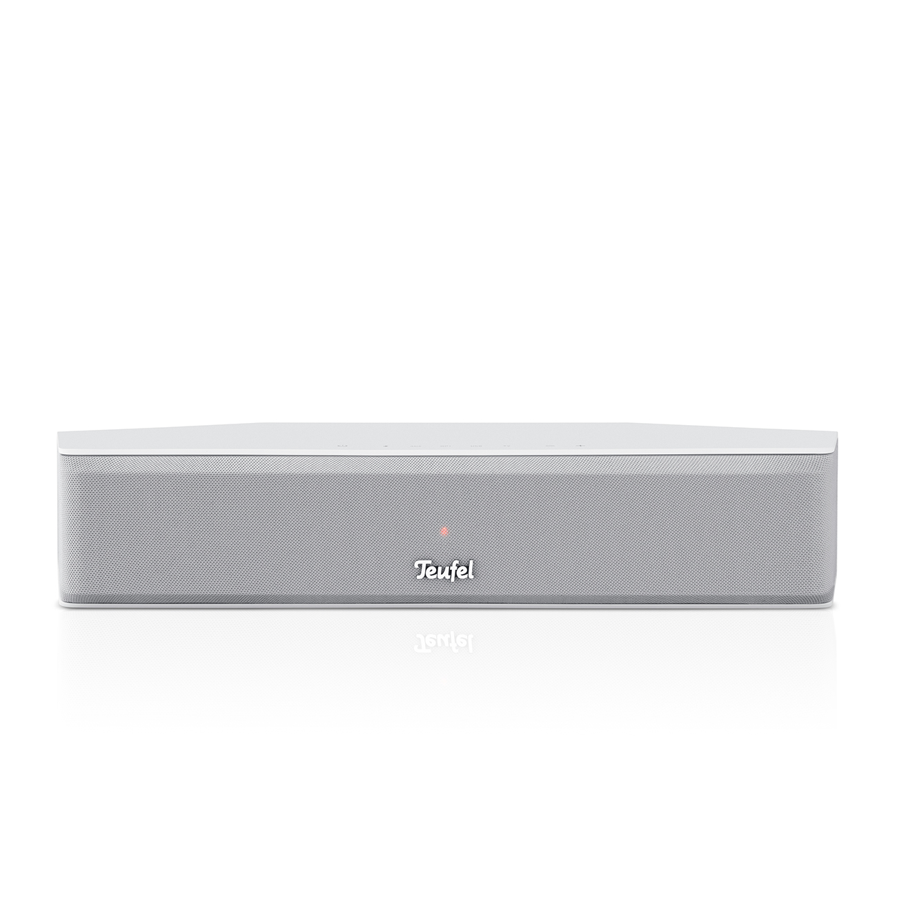 Ein weißer Soundbar-Lautsprecher auf einer weißen Oberfläche. Das Wort 'Teufel' steht auf dem Lautsprecher.