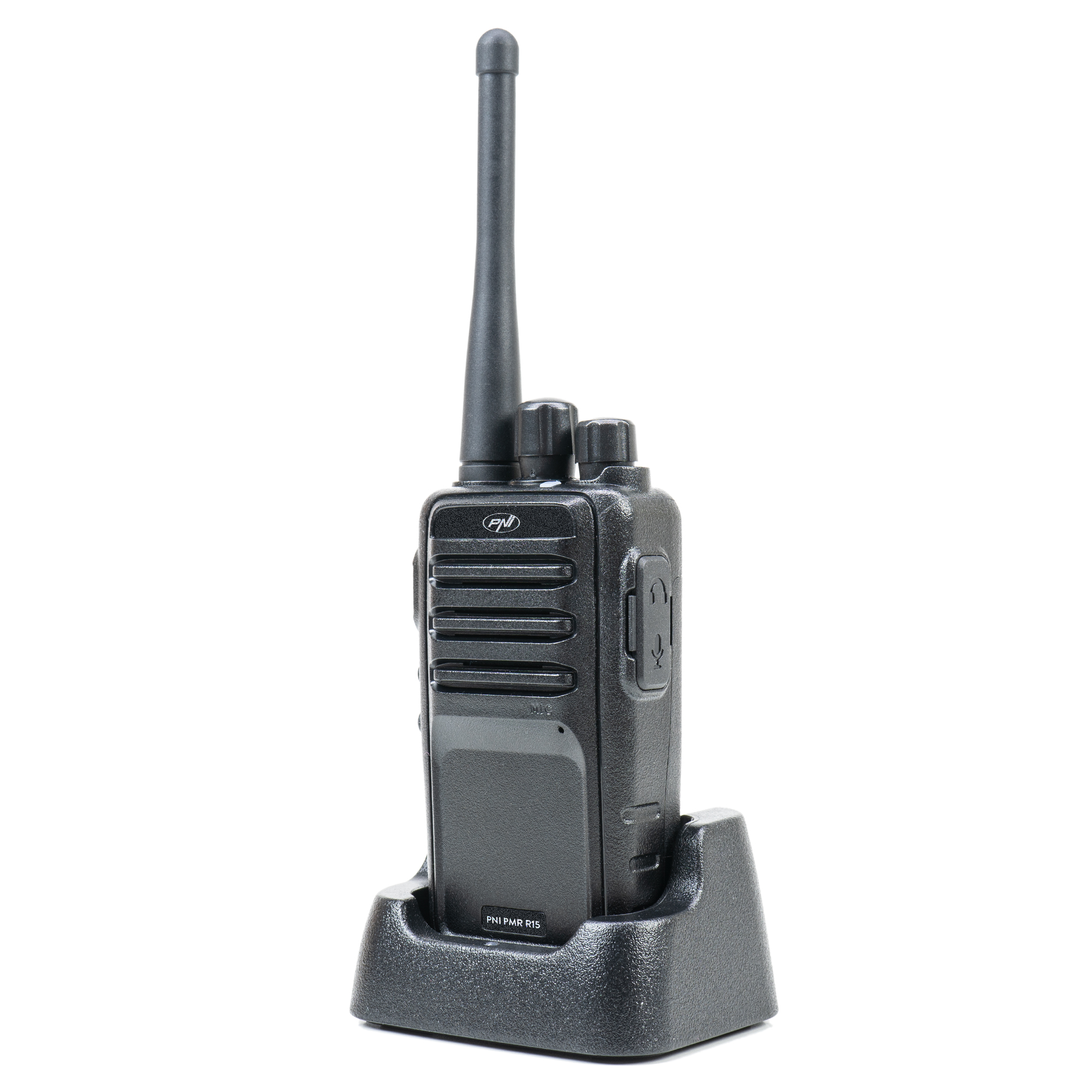 Ein schwarzes Funkgerät auf einer schwarzen Ladestation, mit einer langen Antenne.