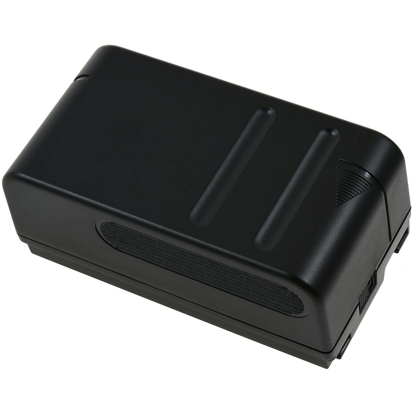Un dispositivo negro rectangular similar a una batería, con superficie texturizada.