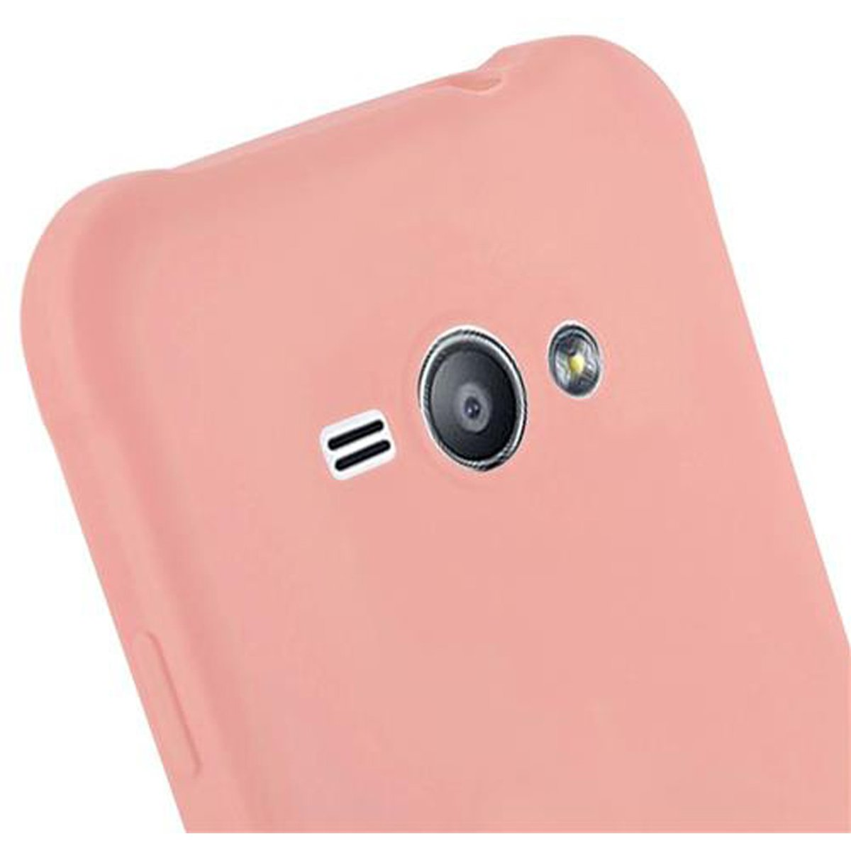Nahaufnahme eines rosa Telefons mit Kamera und Blitz, auf rosa Hintergrund.