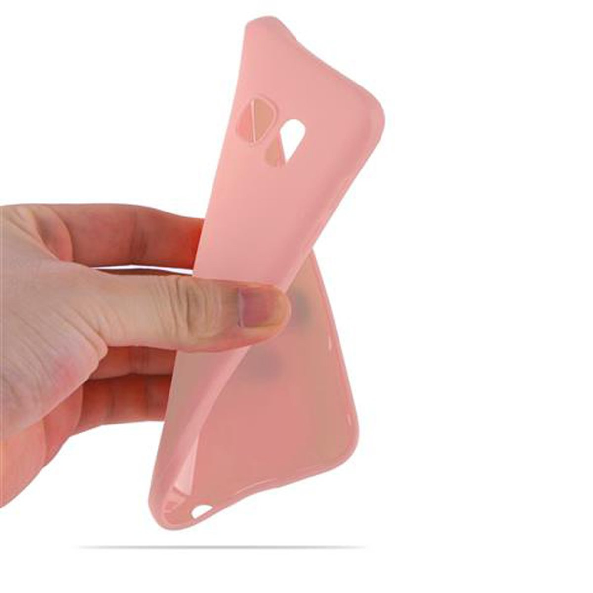 Una mano che tiene una custodia per telefono rosa, piegandola leggermente.