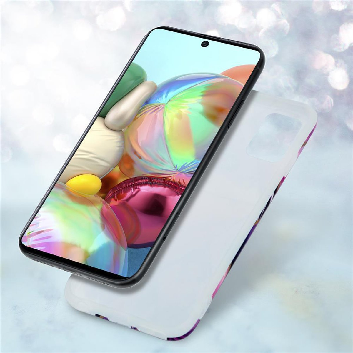 Telefono con sfondo colorato e custodia. La custodia è posizionata sopra un'altra custodia.