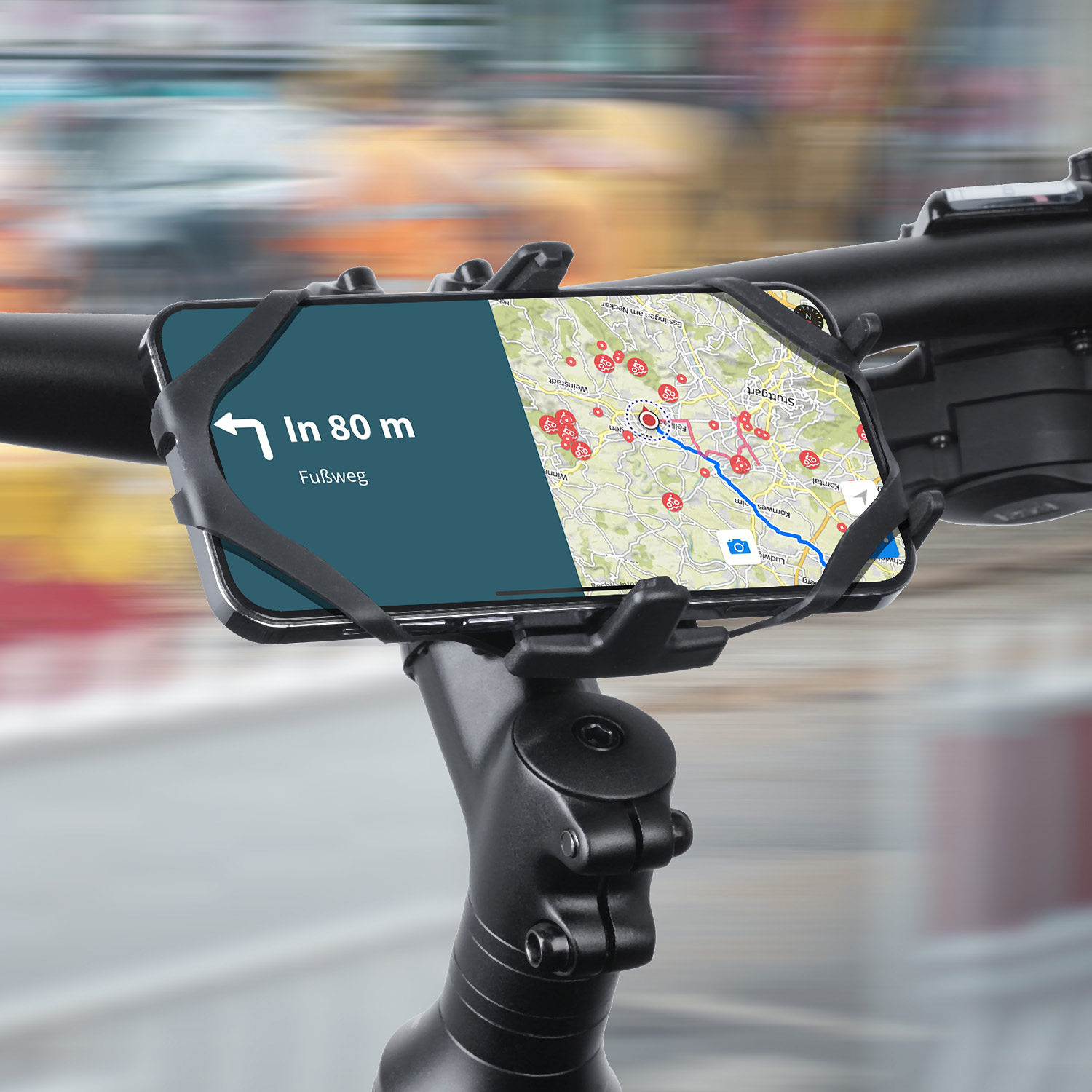 Smartphone an einem Fahrradlenker montiert, zeigt eine Karte mit Navigationsroute und Details.