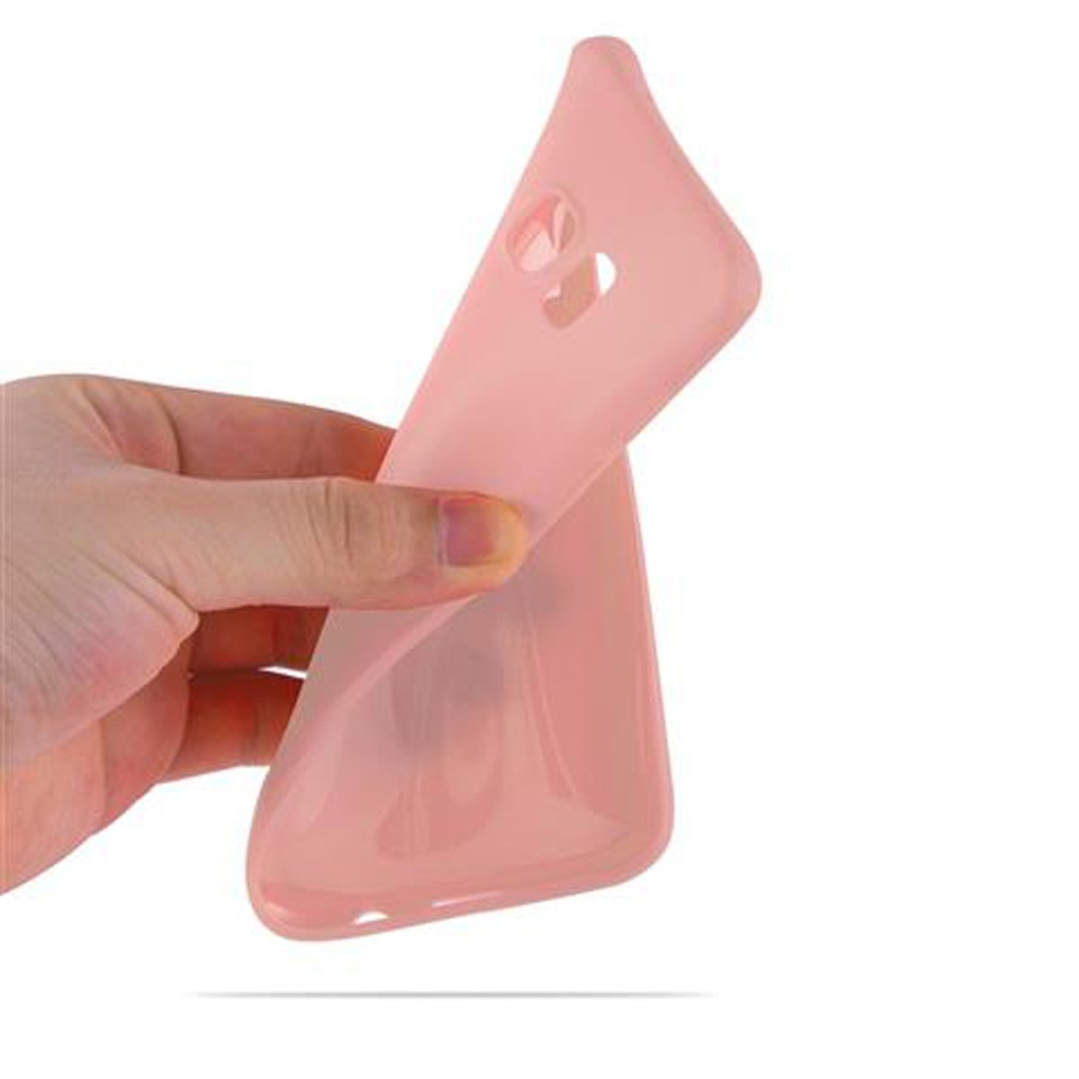 Una mano sosteniendo una funda de teléfono rosa. La funda es flexible y está doblada.