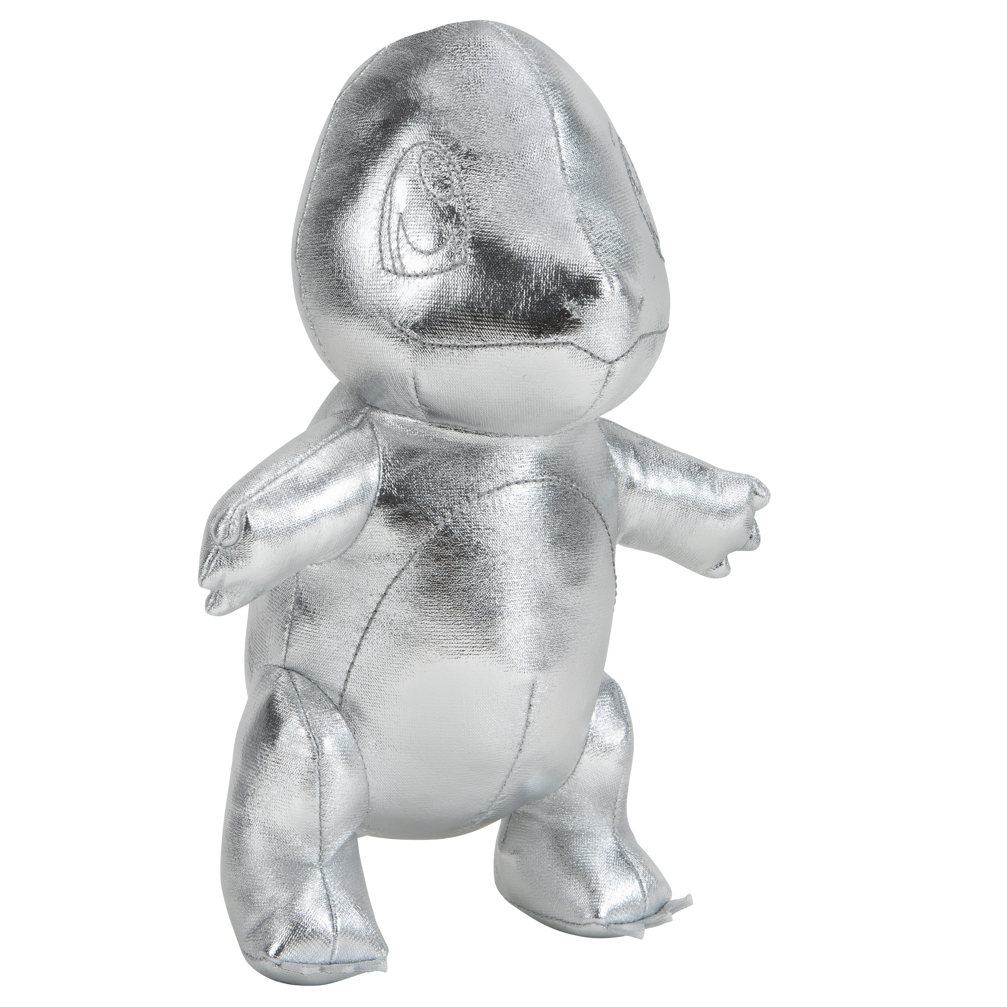 Ein silbernes, metallisches Schiggy-Plüschtier steht auf einer weißen Oberfläche. Es glänzt und hat die Arme an den Seiten.