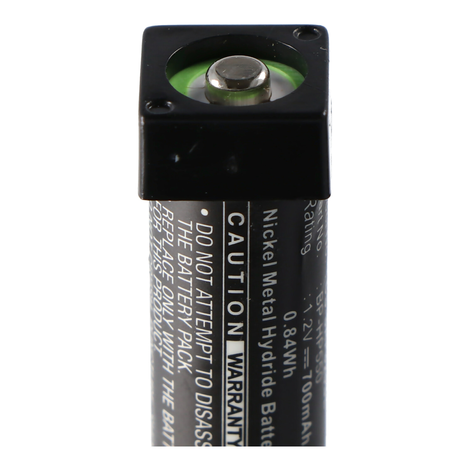 Eine schwarze zylindrische Batterie mit Text und einem grünen Deckel. Es hat einen Vorsichtshinweis und eine Garantie.