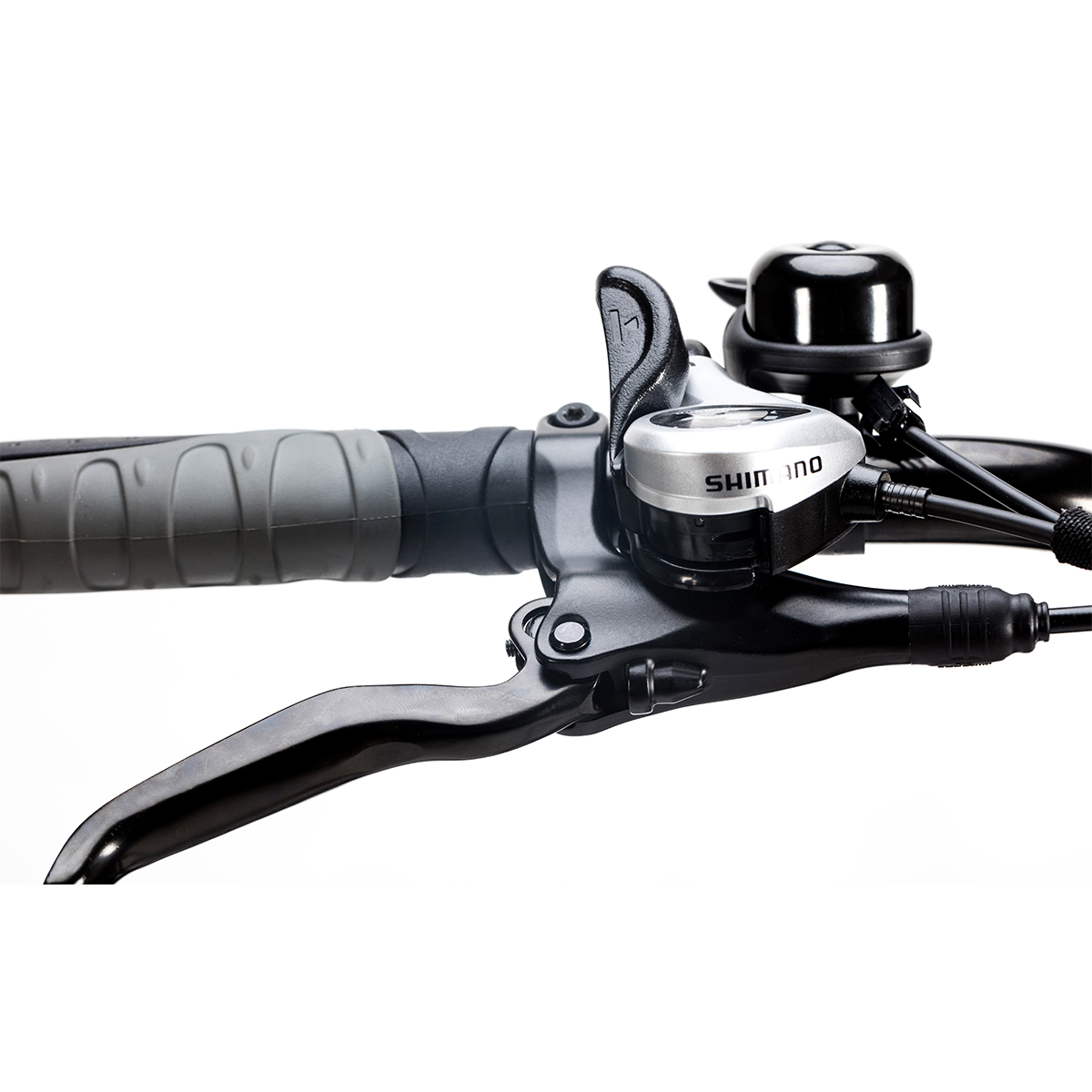 Manubrio della bicicletta con campanello e cambio Shimano.