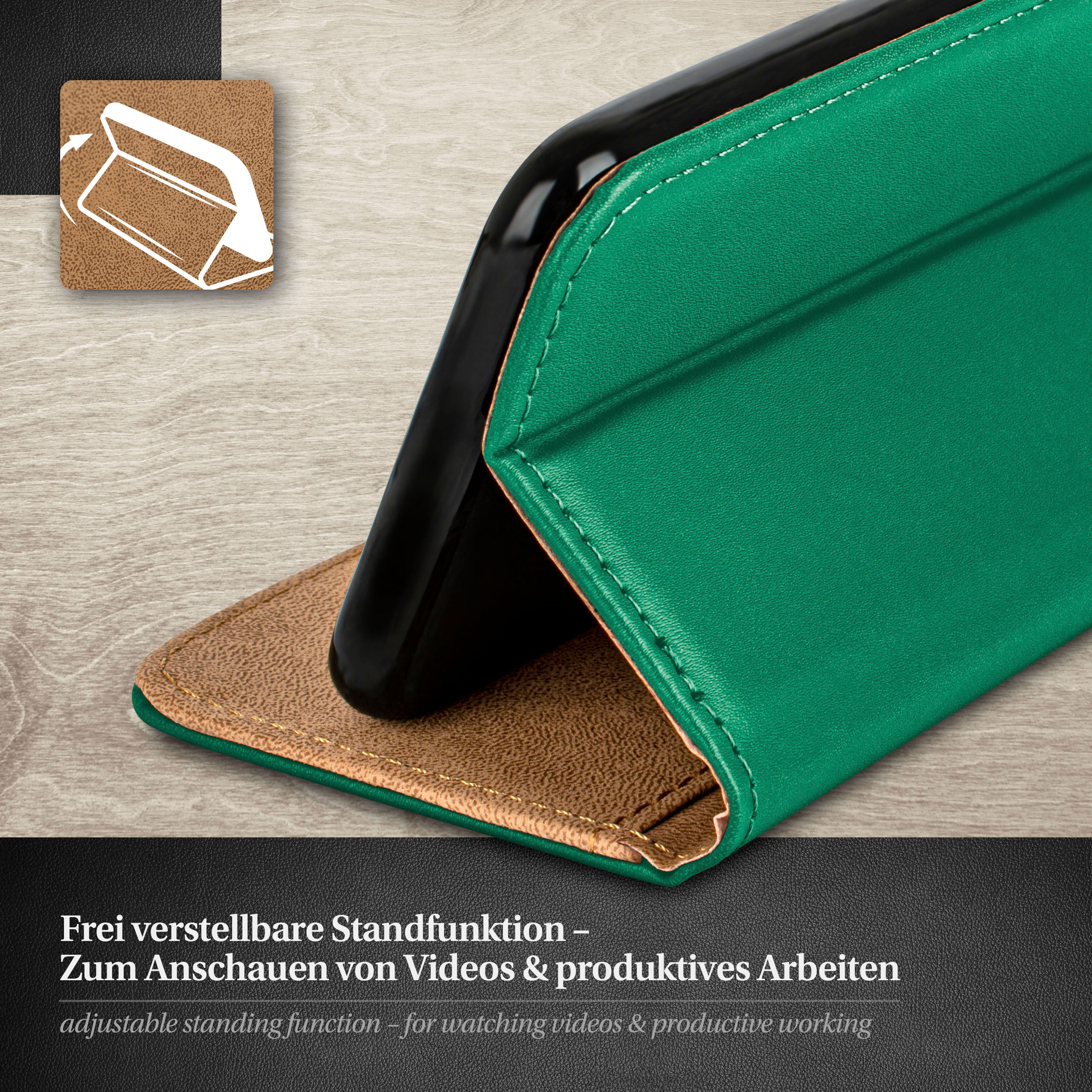 Eine grüne Handyhülle mit einem schwarzen Telefon darin, auf einer Holzoberfläche. Text ist vorhanden.